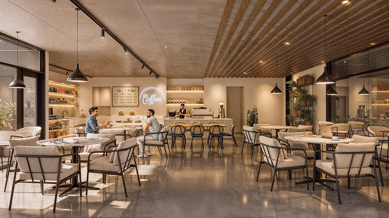 View of cafe with two people sitting down next to each other
