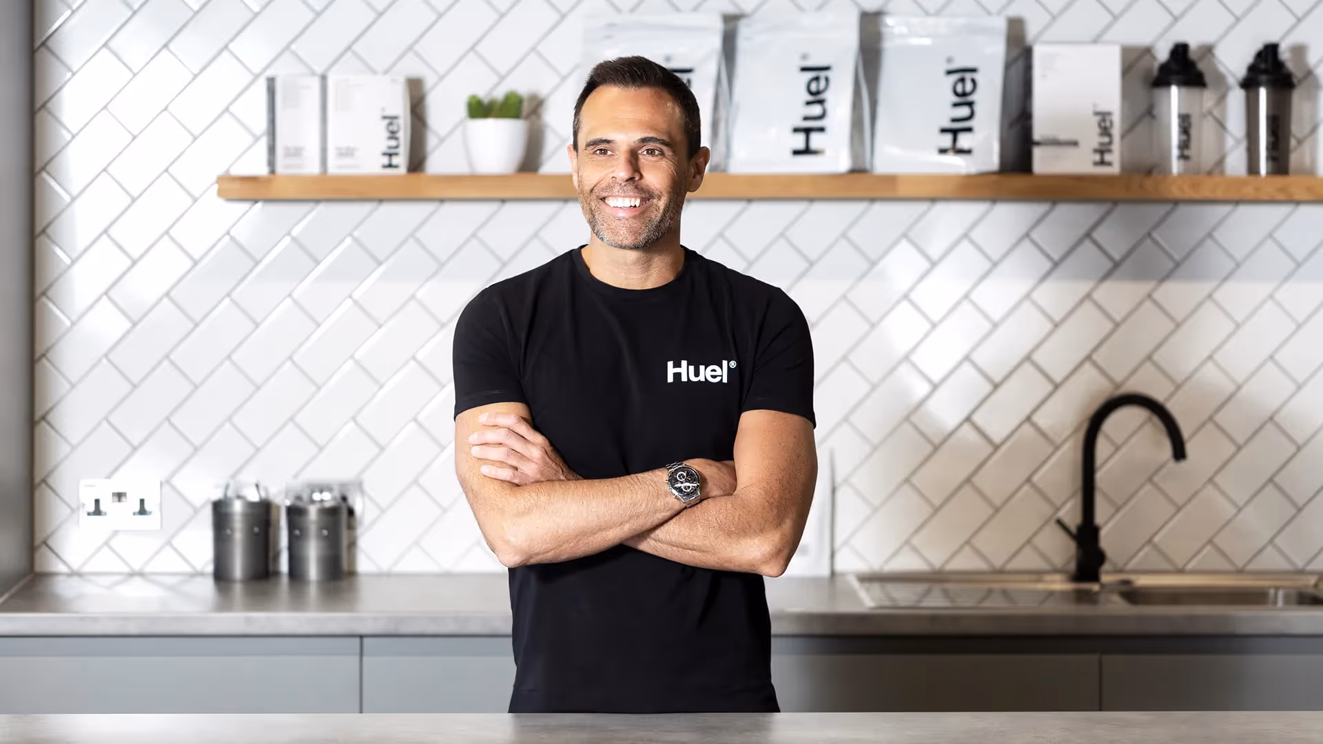 Founder of Huel standing in company kitchen