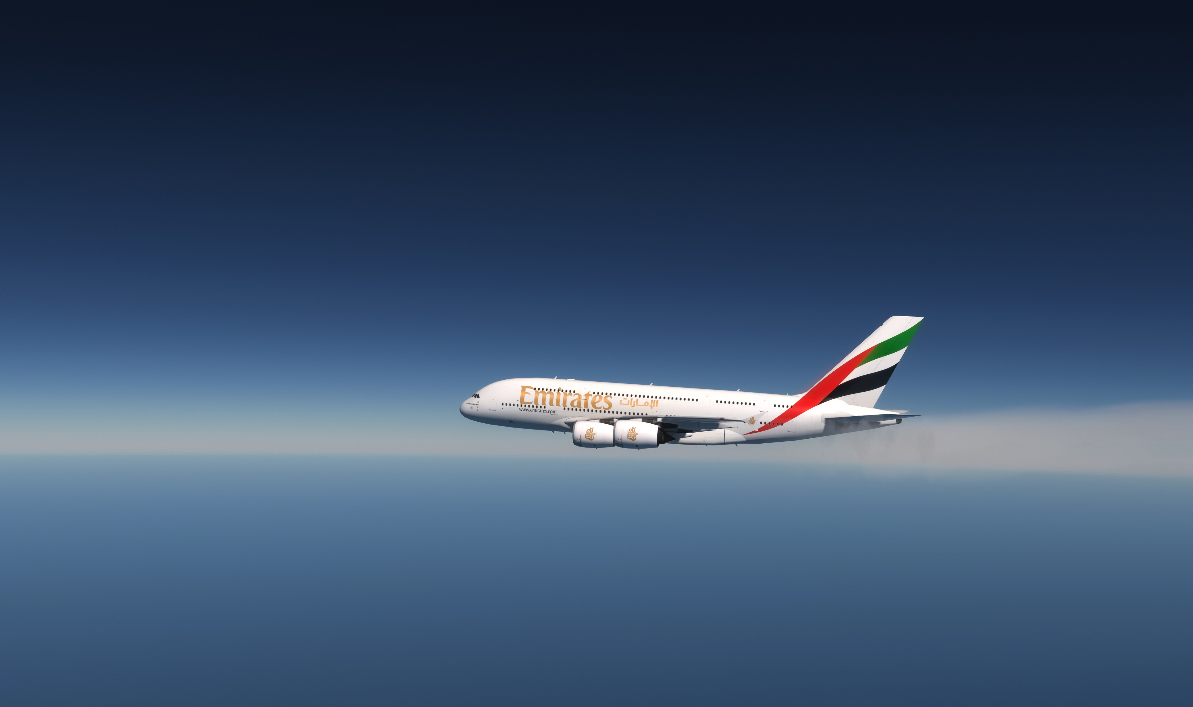 Emirates aeroplane flying through the sky