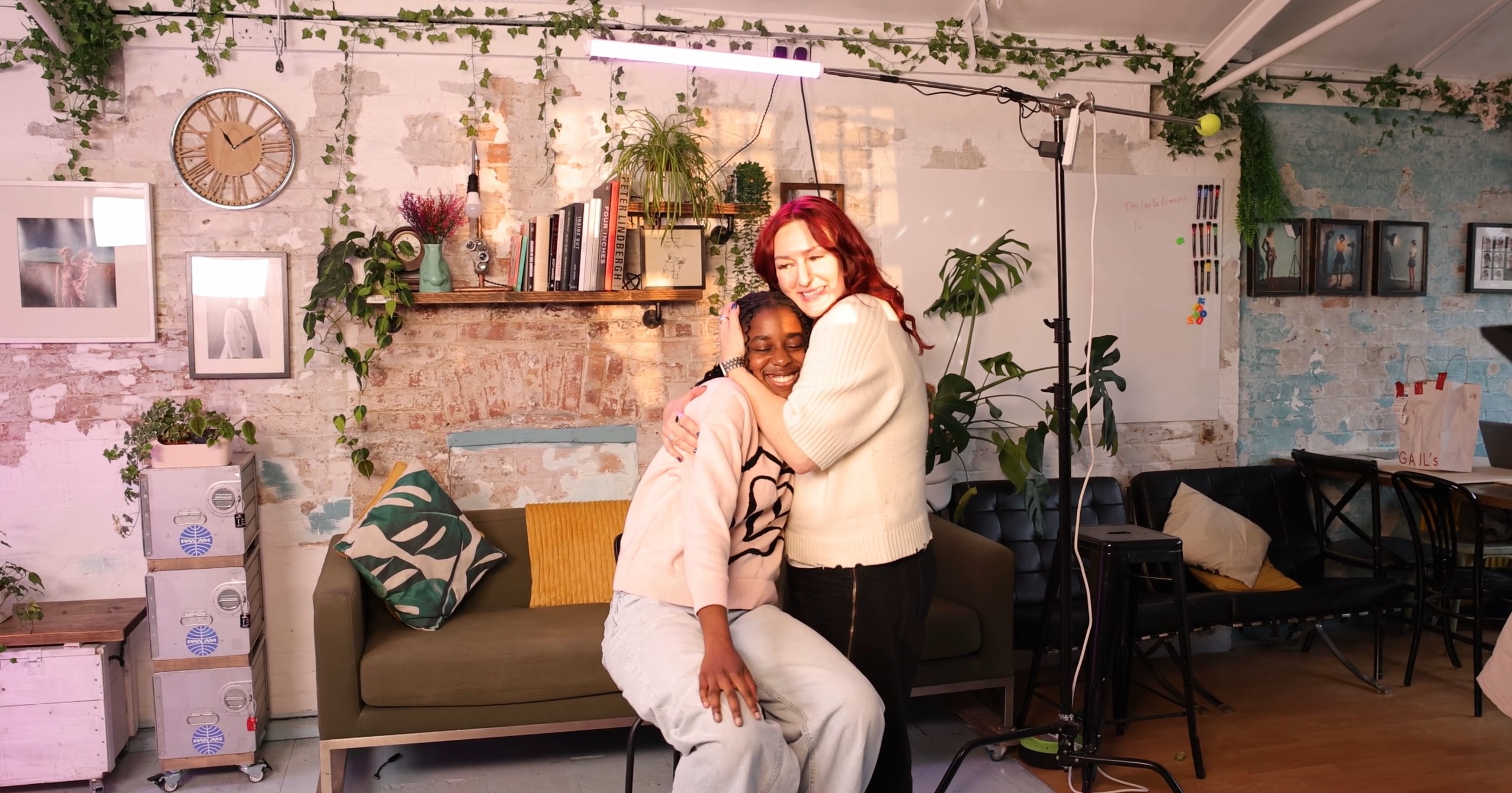 Thrive Mentoring - Mentor giving young mentee a hug