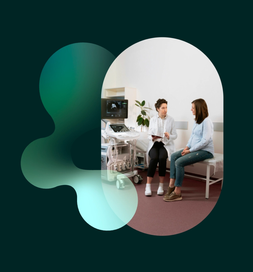 Short image of a doctor and a pregnant patient in an ultrasound room within a circular cutout on a dark green background.