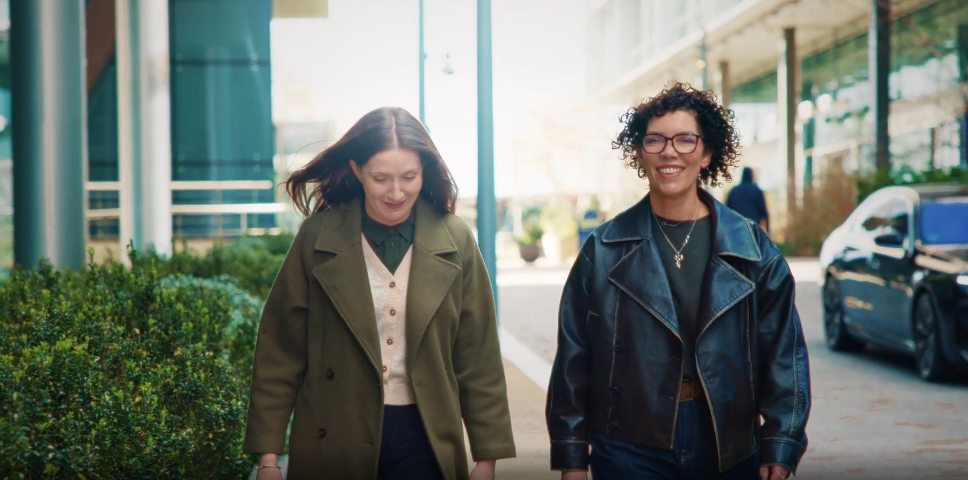 The British Retail Consortium employees talking and walking outside their office