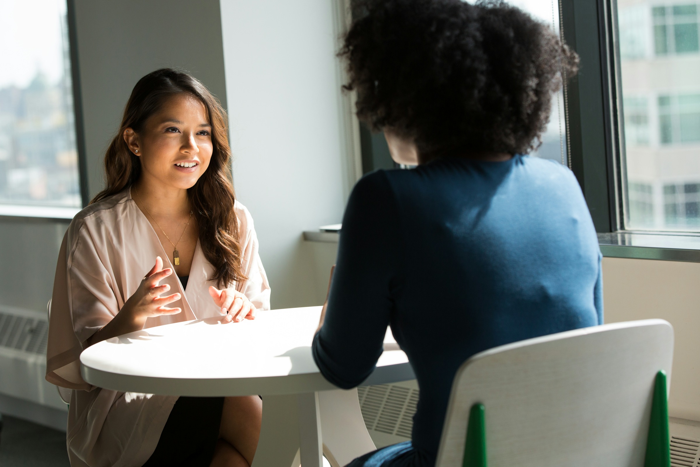 Business professional at crossroads making strategic decisions - StartupStage Blog