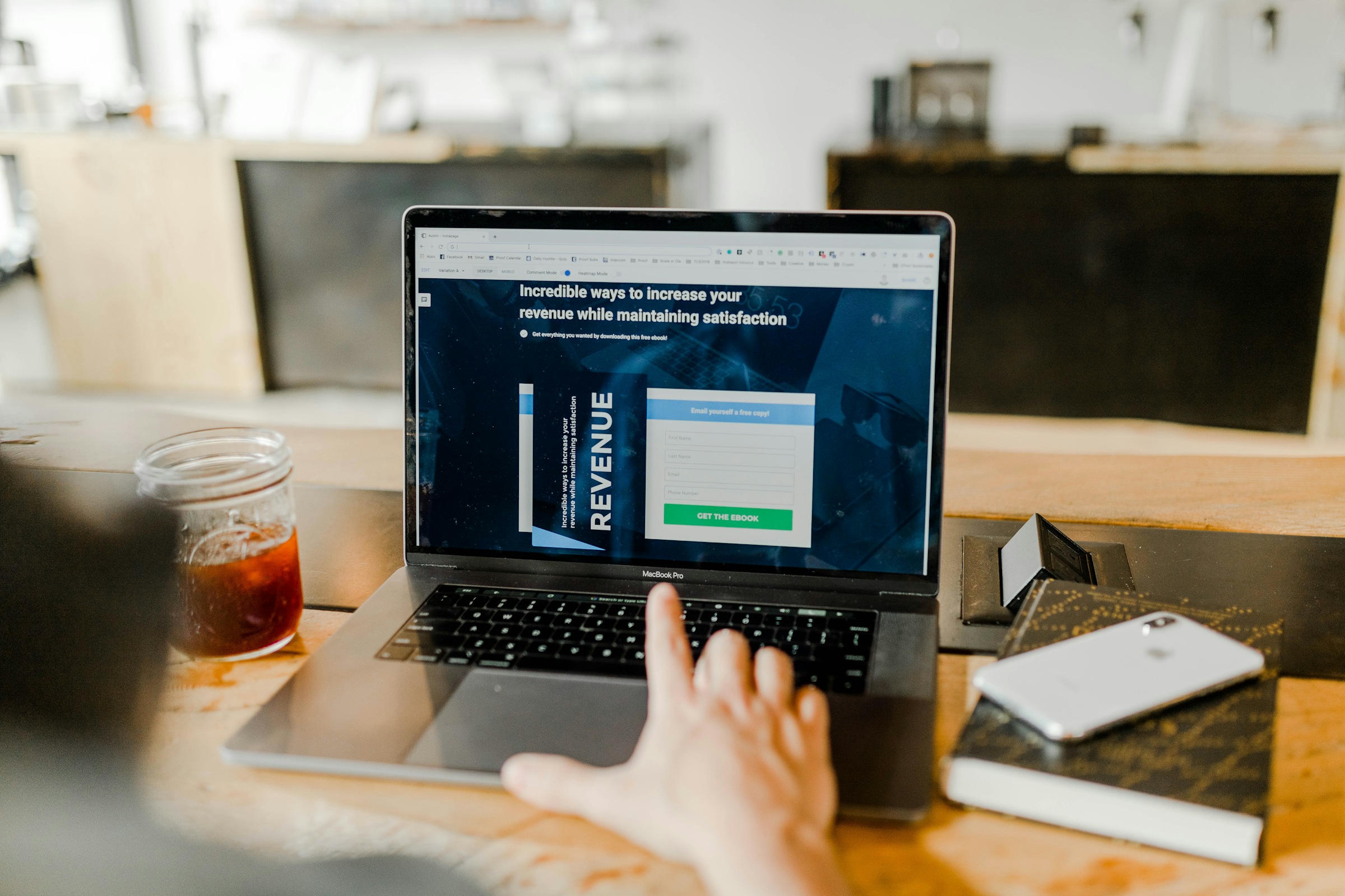 Startup founders analyzing funding options and growth strategies - StartupStage Blog