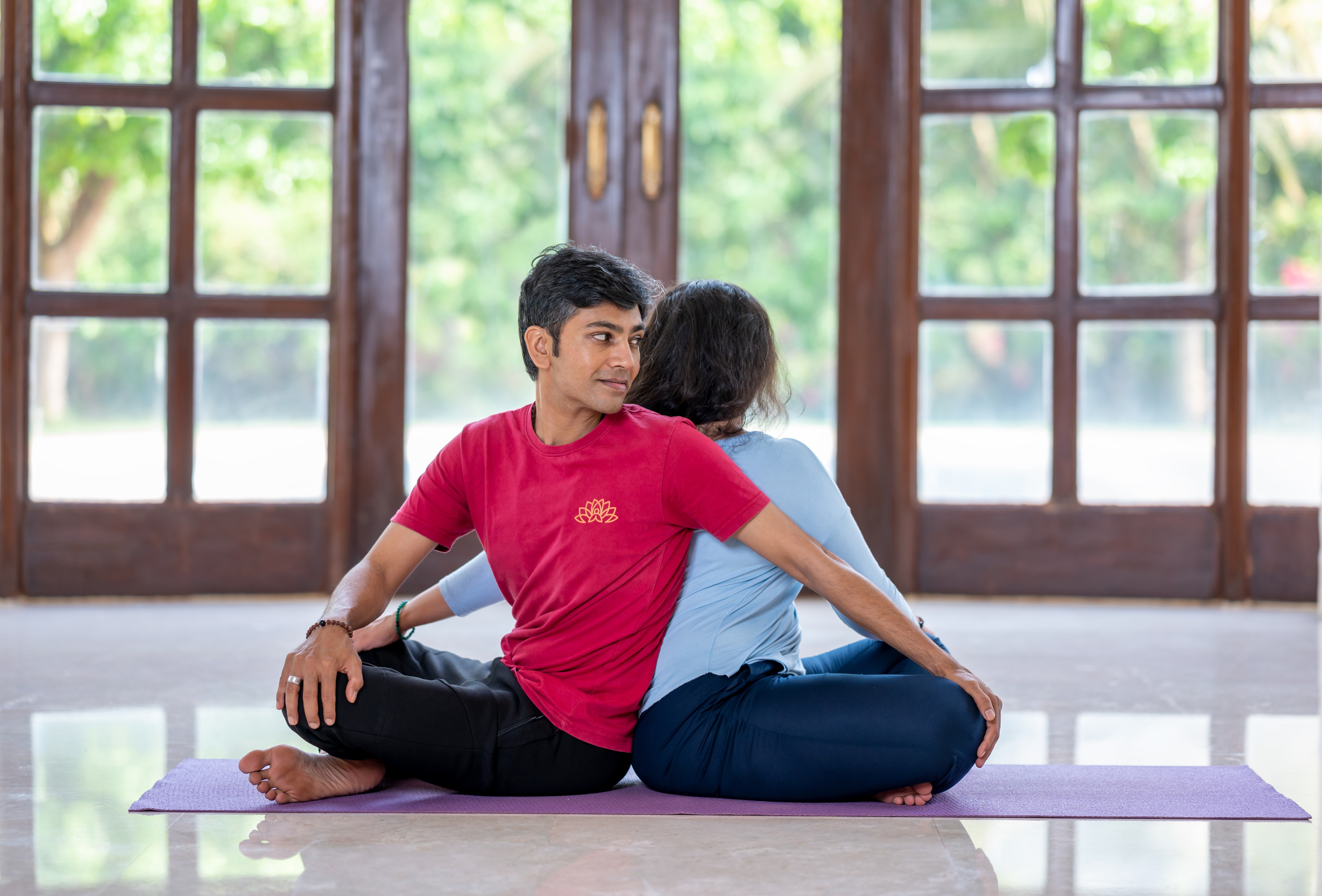 Seated spinal twist for two (beginner level)