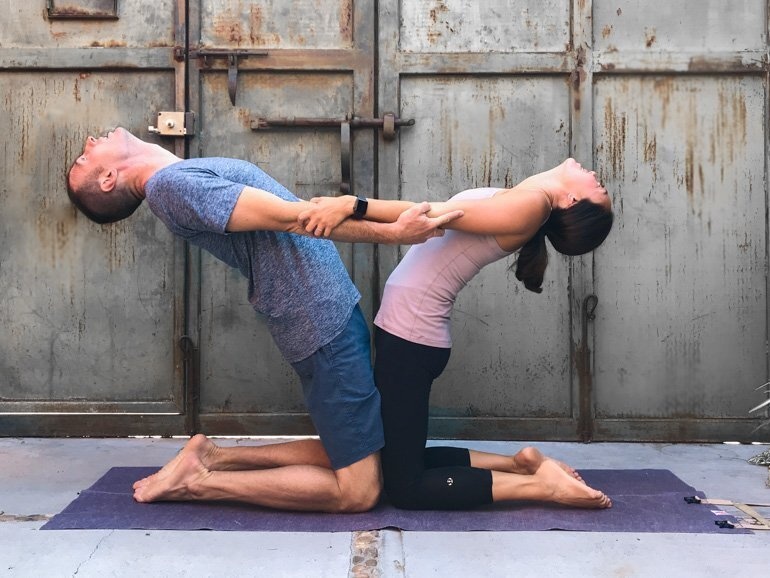 Partner camel pose (intermediate level)