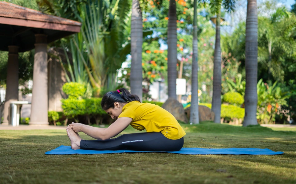 Seated Forward Fold for PCOS