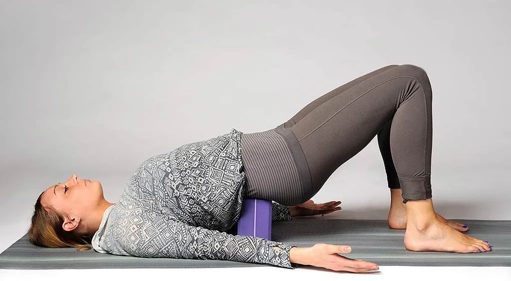 supported-bridge-pose-2.jpg Bridge Pose