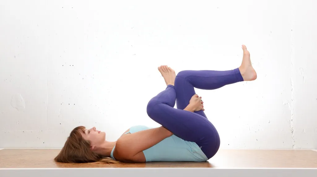 WELLNESS_M70-Yoga_Emily2_1-EyeOfNeedle_Photo-David-Niddrie-2131.jpg Eye of the Needle Pose