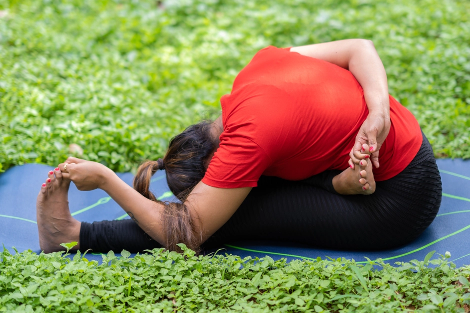 Ardha Baddha Padma Paschimottanasana
