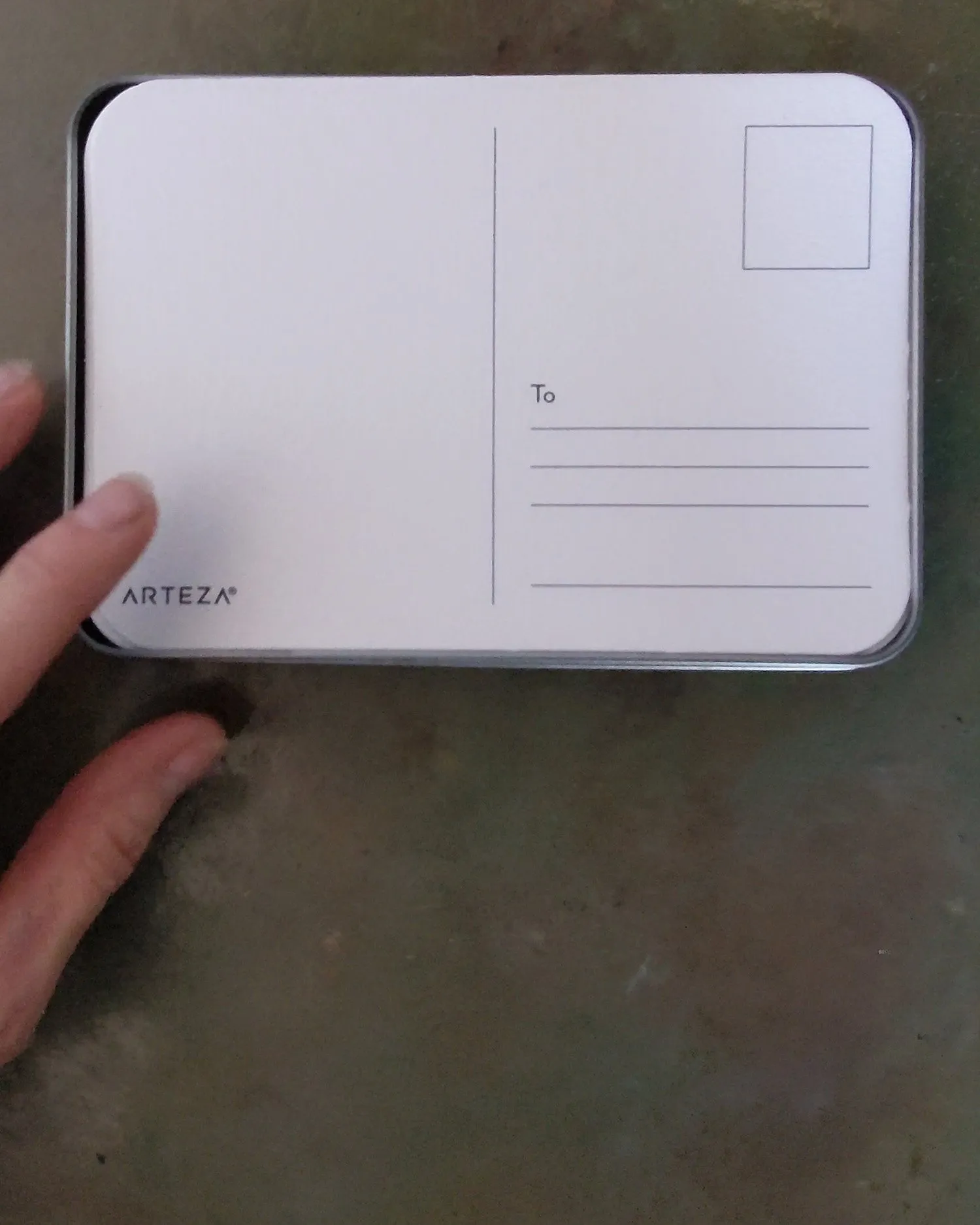 back of a postcard with round corners