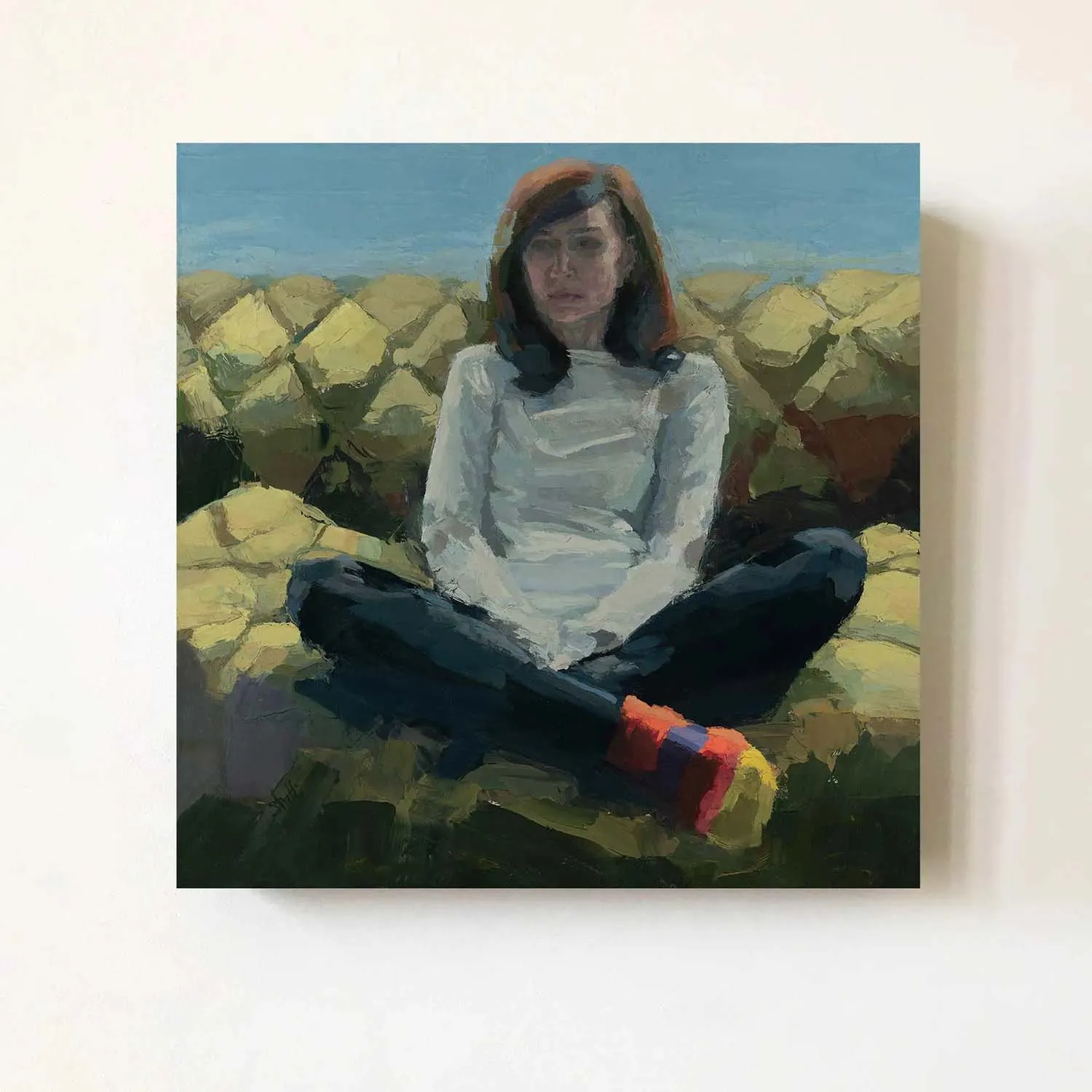 oil painting of artist sitting on a green couch