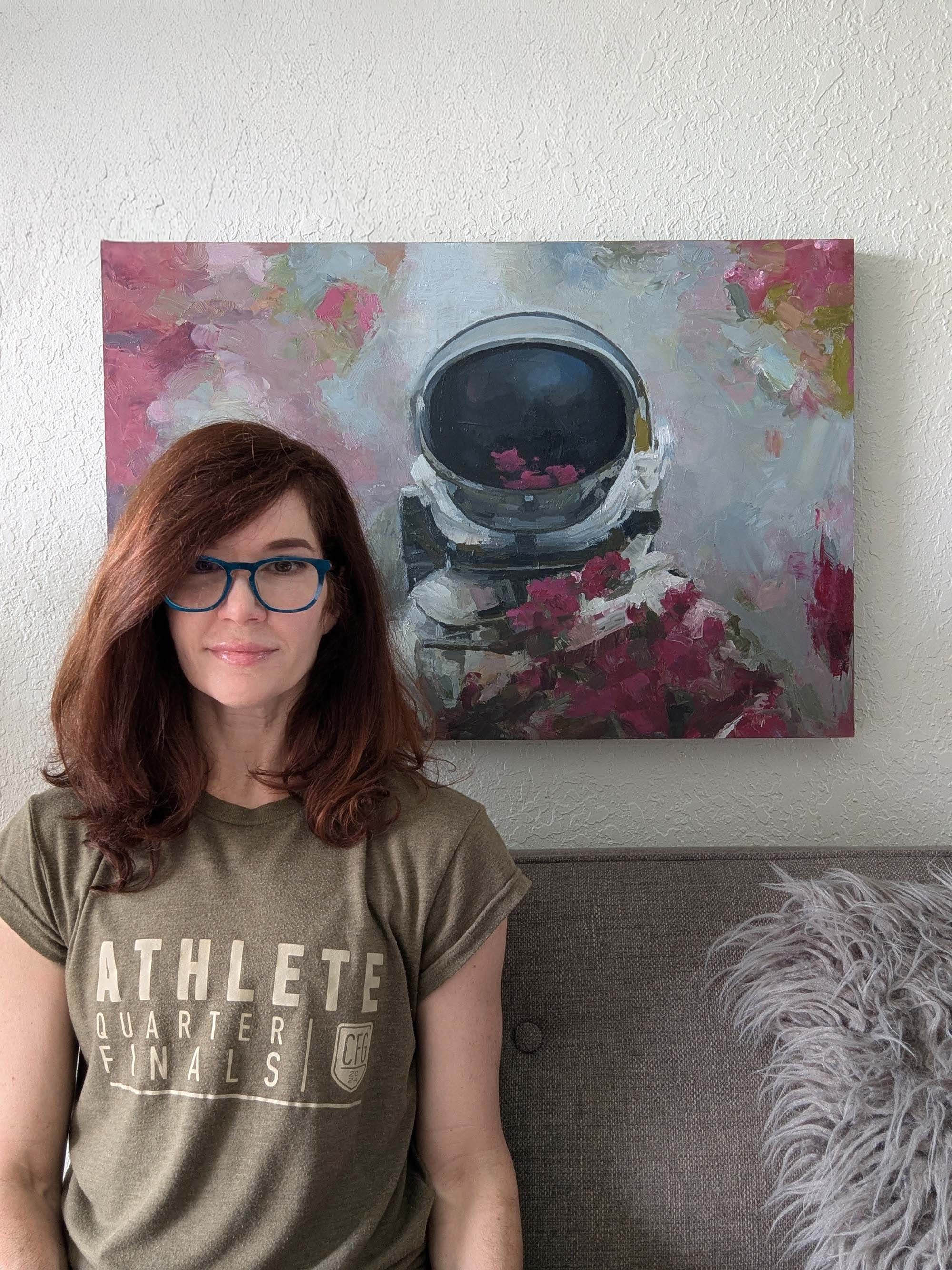 artist and oil painting of a female astronaut behind a dark visor surrounded by fuschia flowers and holding a scientific projectile equipment