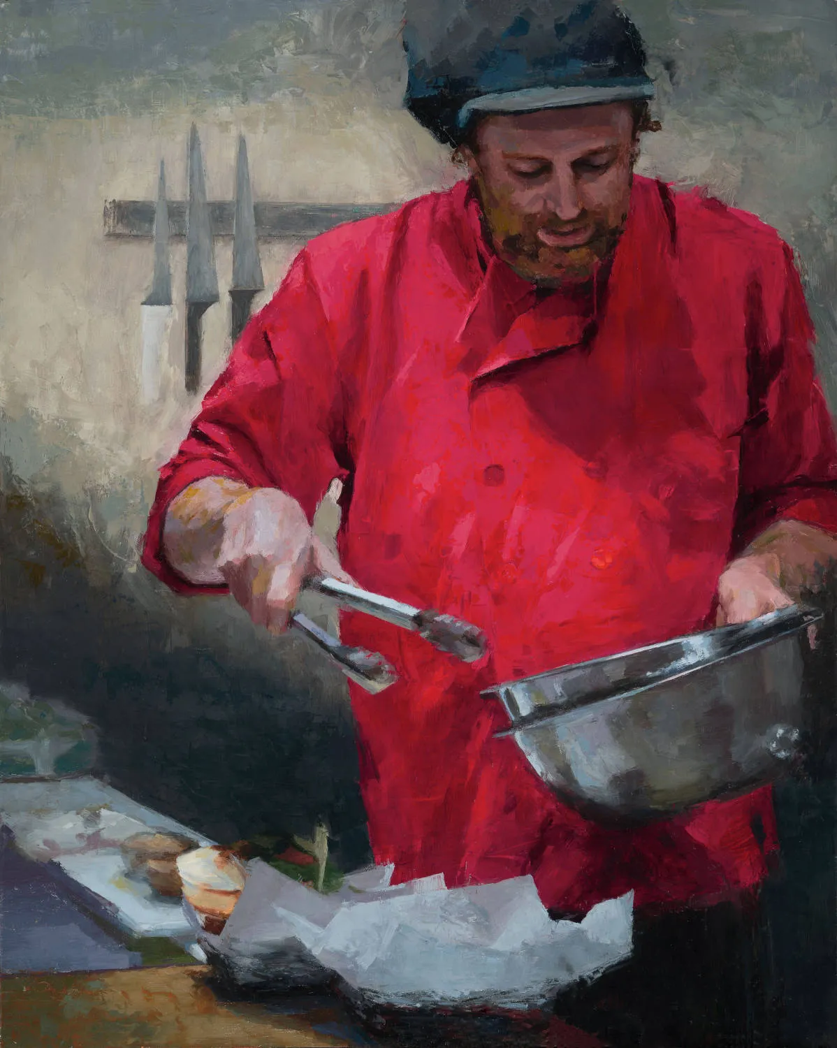 oil painting of a bearded man in a bright red chef's coat and dark cap, plating food with tongs and a stainless steel bowl; two knives mounted on a magnetic strip behind him