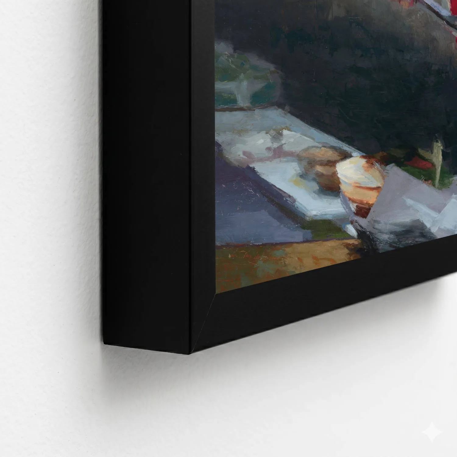 edge of a painting with a black frame hanging on the wall