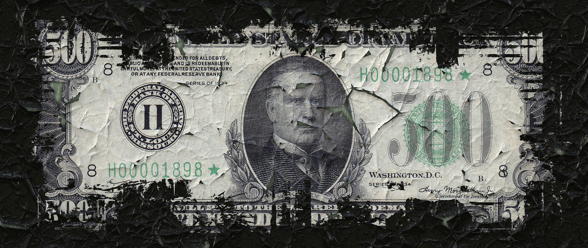 Crumpled 500 dollar bill