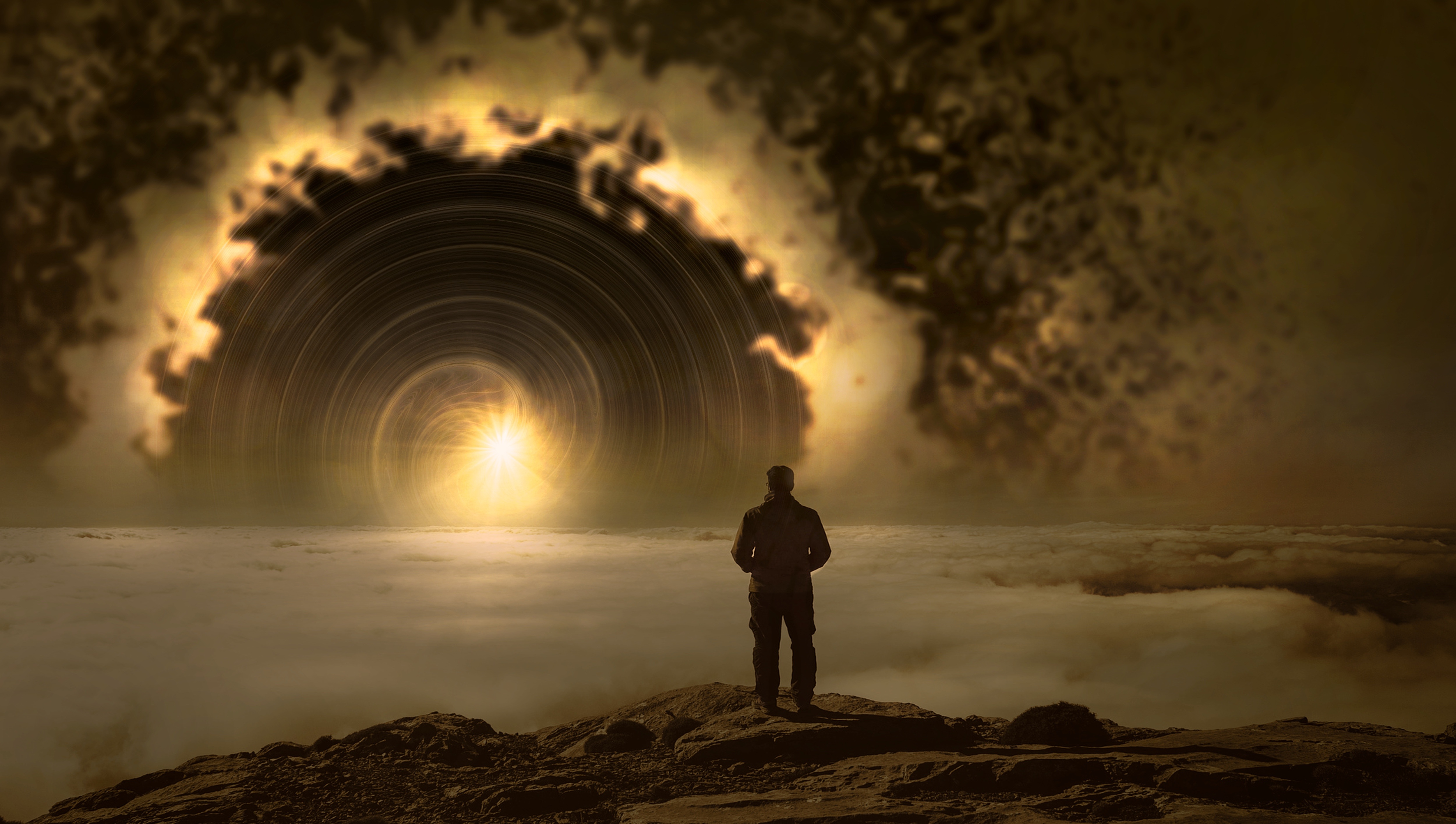 Person standing before a glowing tunnel of light
