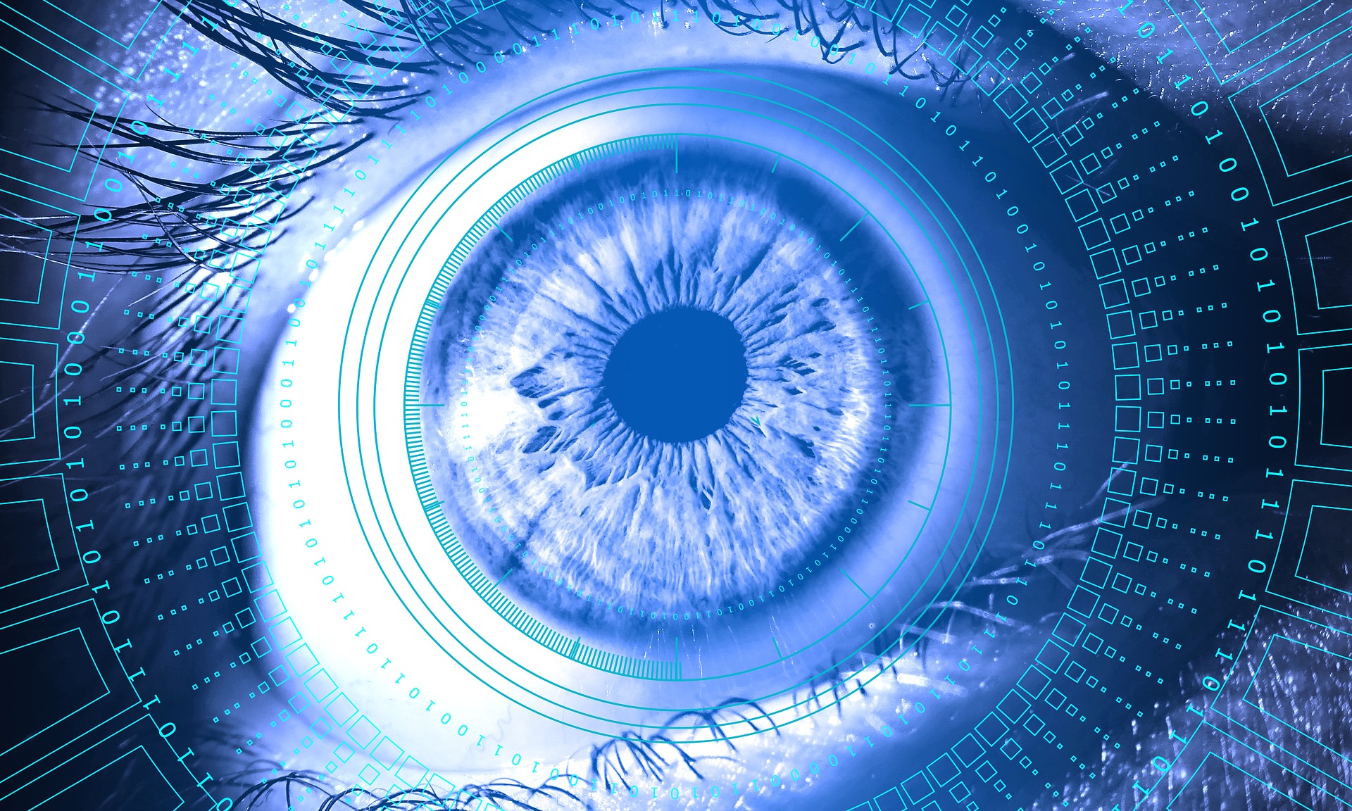 Close-up of a blue eye with digital patterns