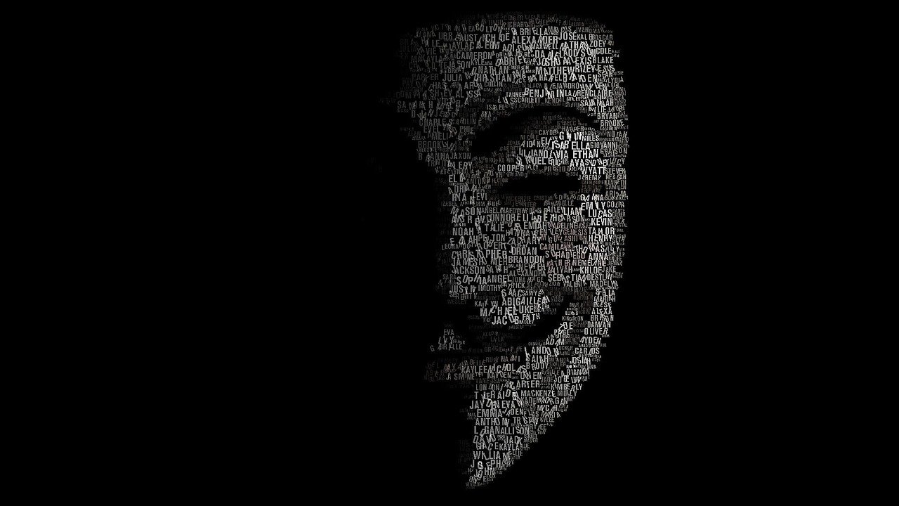 Anonymous mask made of code on a dark background