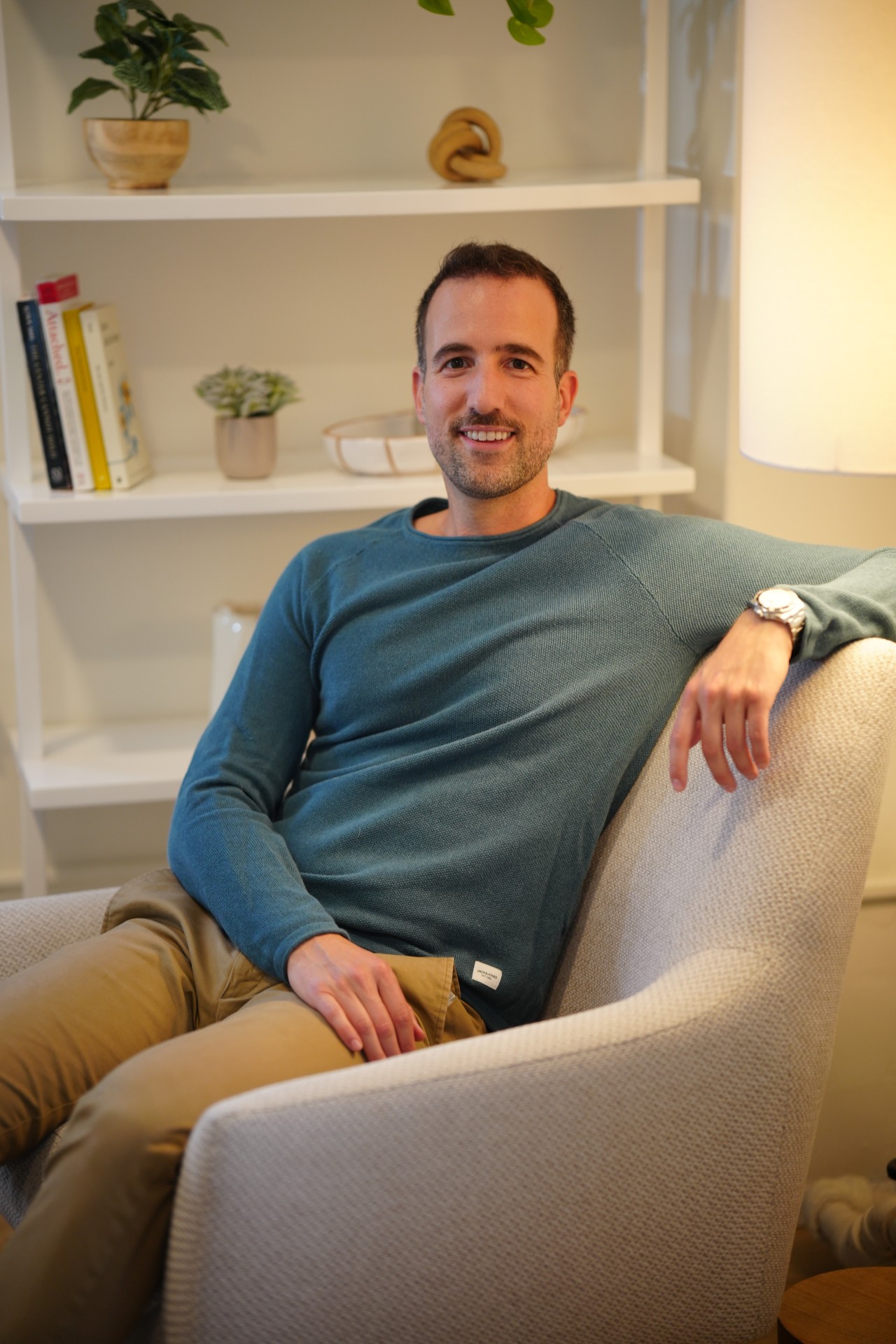 Psychiatrist Dr. Noy sitting at desk Arium psychiatry NYC