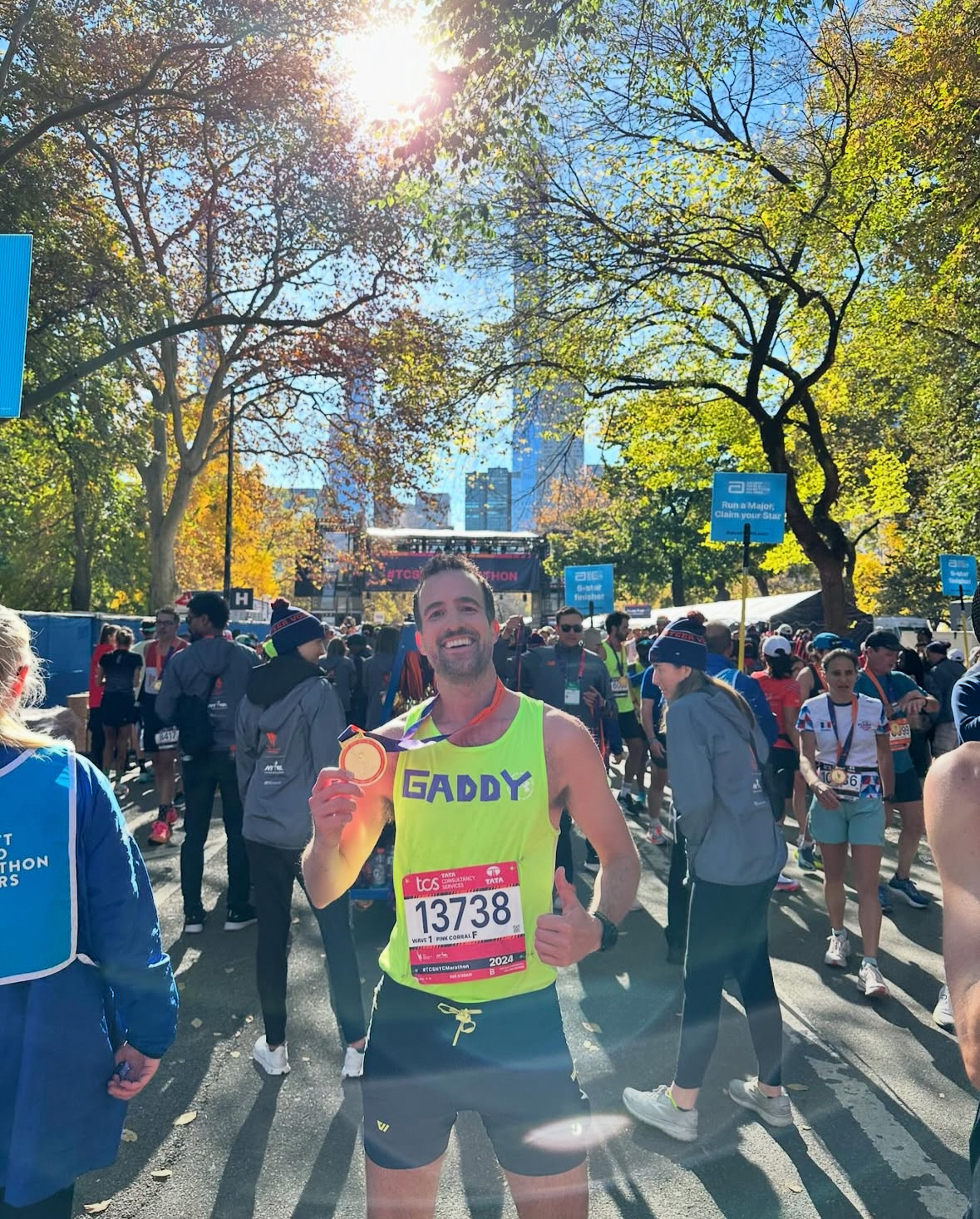 Dr. Gaddy Noy holding his medal after completing the 2024 NYC Marathon — his first marathon