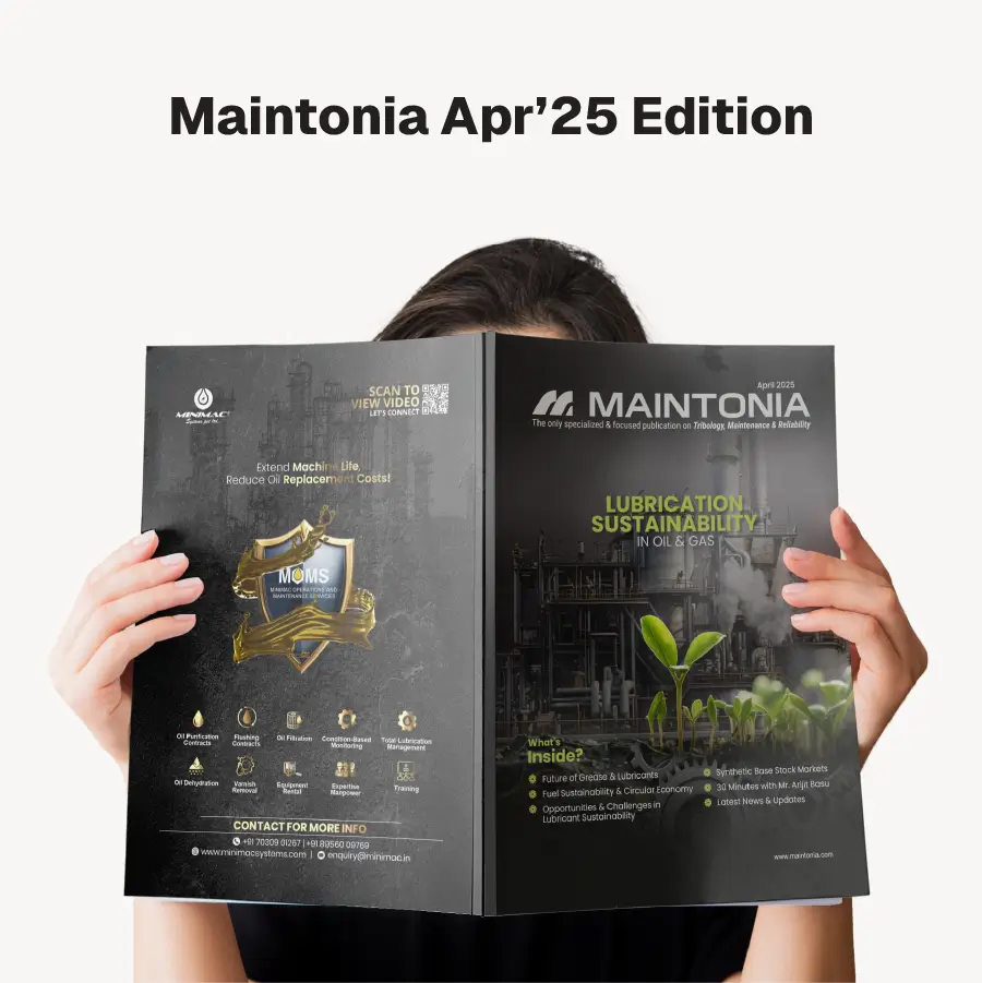 Person holding the April 2025 edition of Maintonia magazine focused on lubrication sustainability in oil and gas with green plant imagery on the cover.