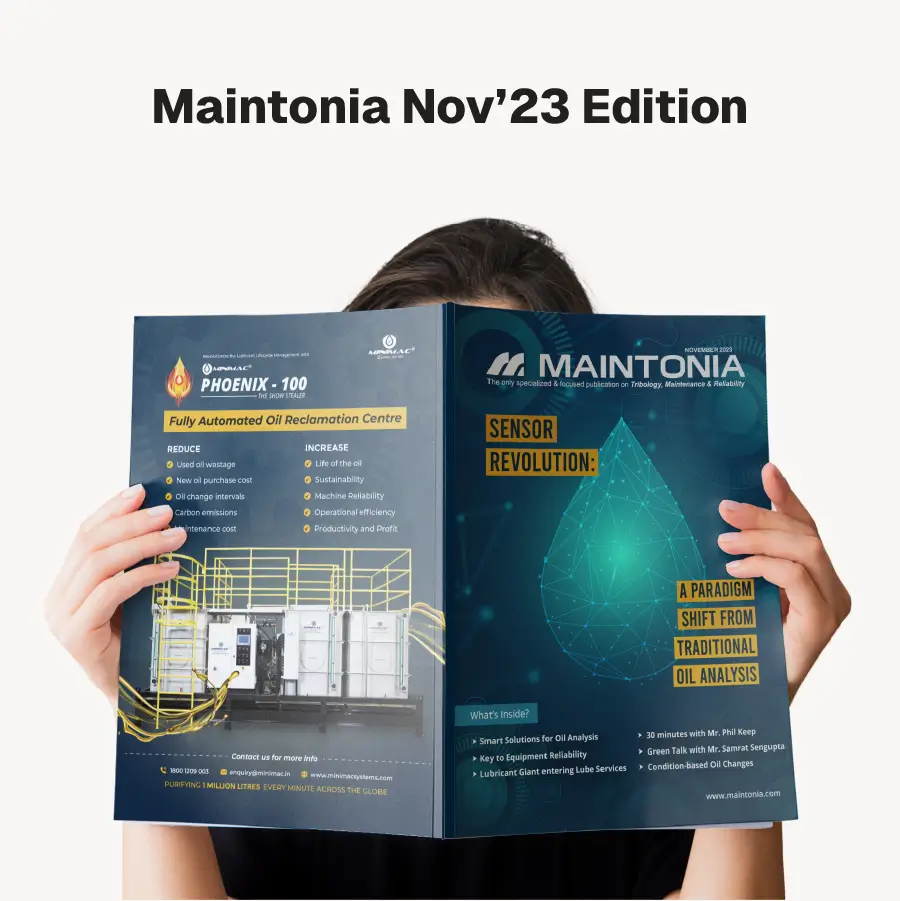 Person holding open the Maintonia Nov’23 Edition magazine with headlines on sensor revolution and automated oil reclamation technology.
