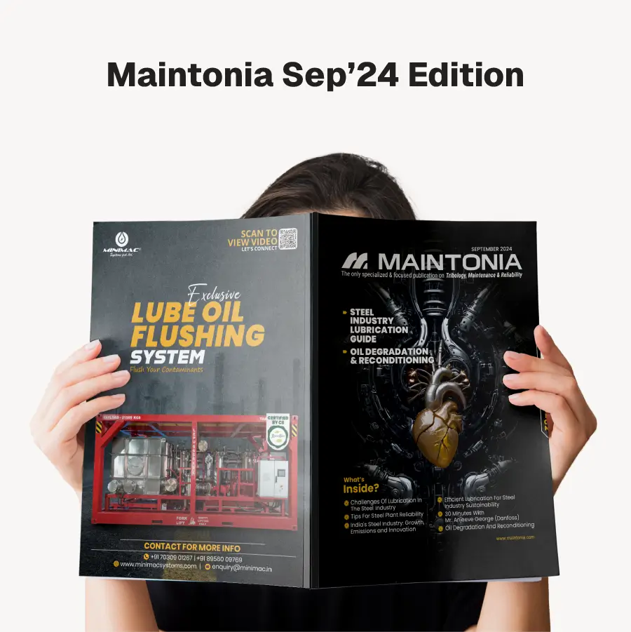 Person holding open the September 2024 edition of Maintonia magazine featuring articles on steel industry lubrication, oil degradation, and a lube oil flushing system.