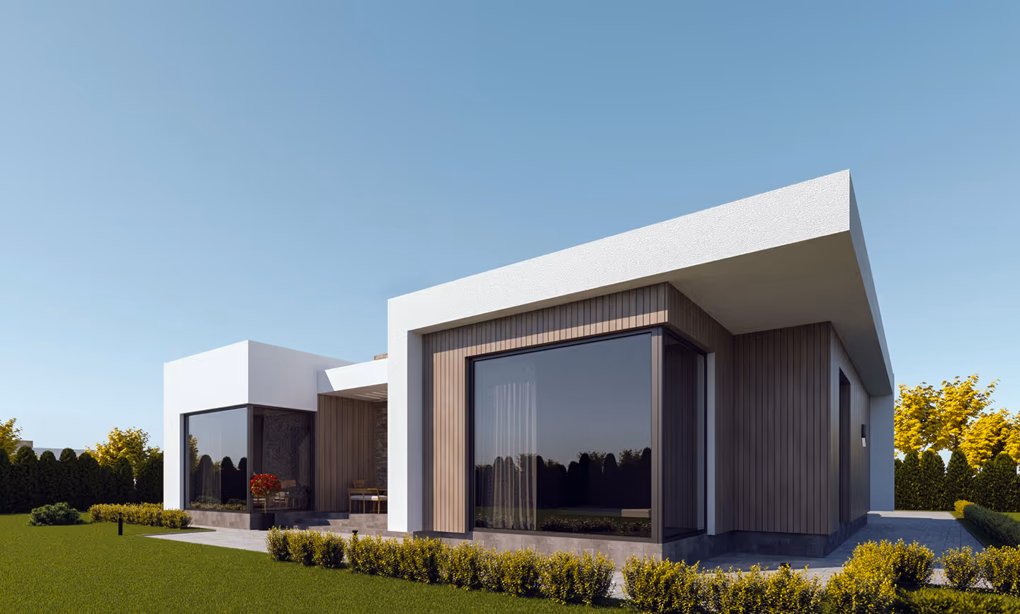 Сучасний одноповерховий будинок з великими панорамними вікнами та озелененою територією