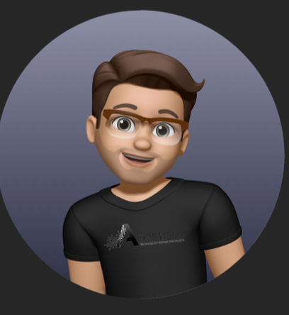 3D avatar of a smiling man with brown hair and glasses wearing a black t-shirt with a logo on it.