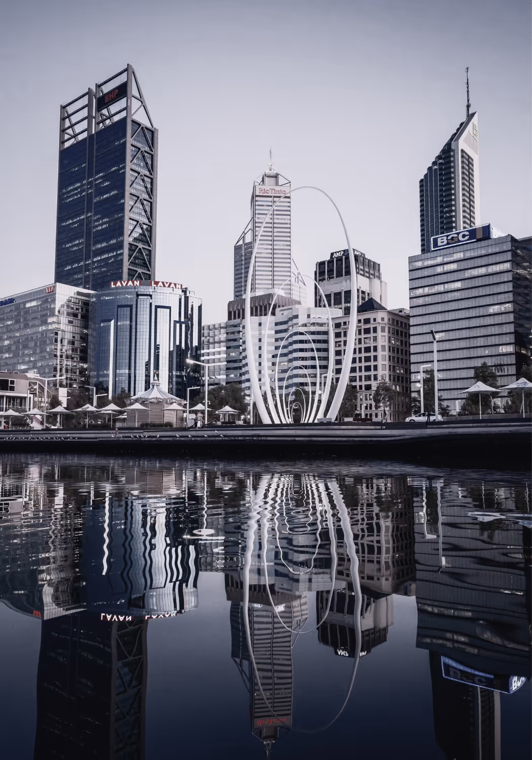 Buildings from the city of Perth reflected in the water at Elizabeth Quay