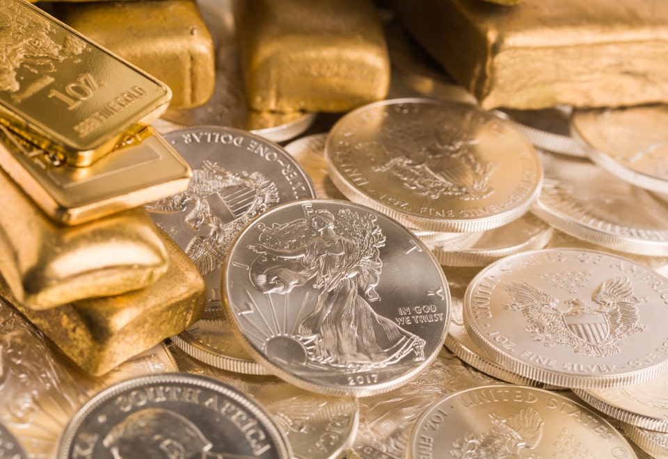 American Silver Eagles and gold bars — trusted retirement assets
