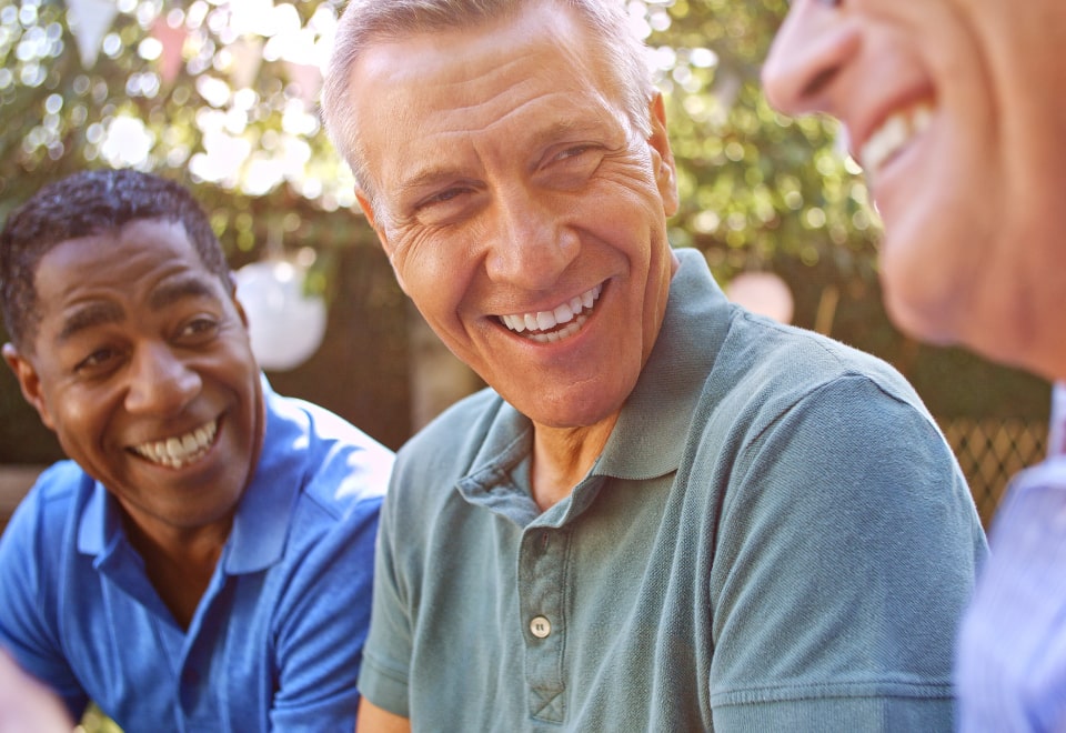 Confident retirees enjoying financial peace of mind