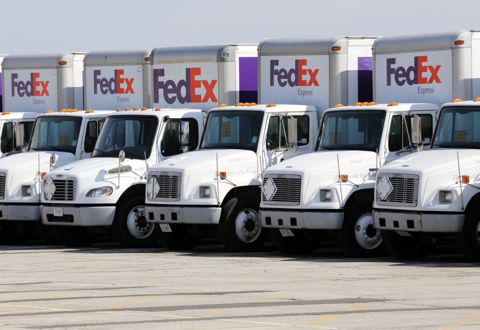 Fleet of FedEx trucks ready for nationwide delivery