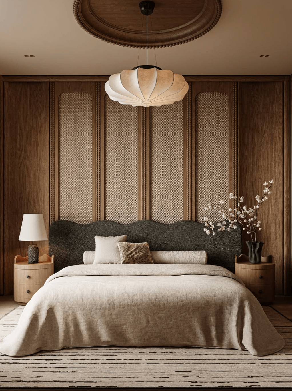 Elegant bedroom with wood panelled wall and neutral tones illustrating Studio Calcaire interior design approach.