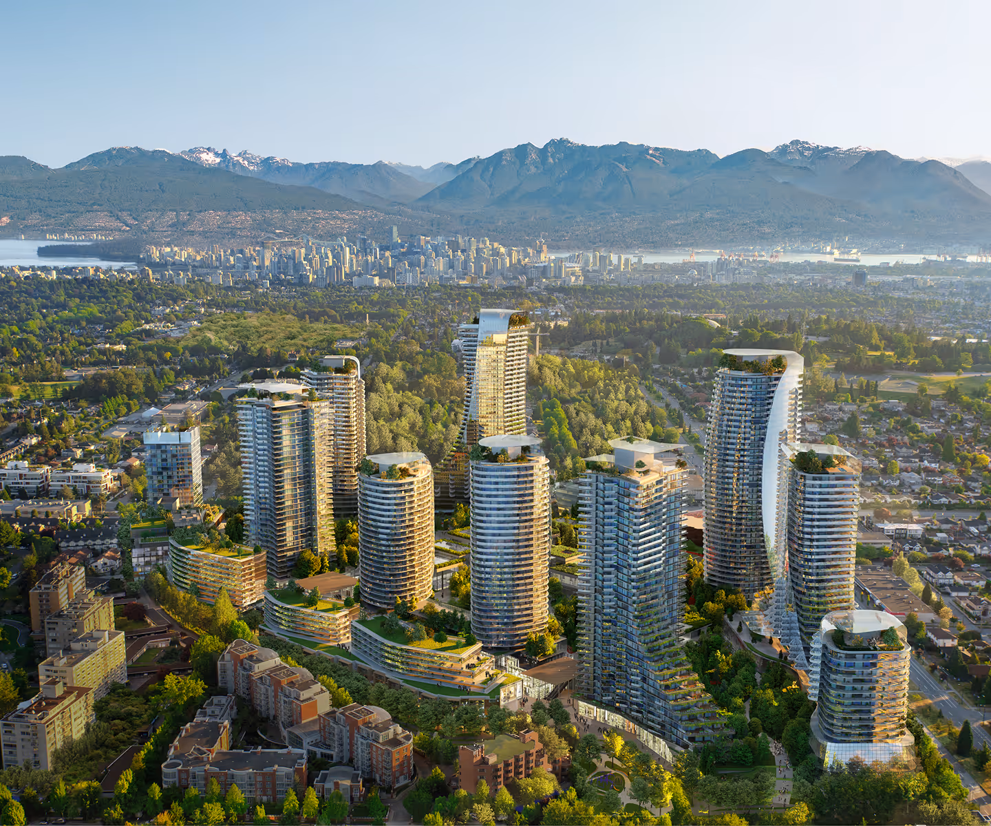 Aerial view of a modern urban residential complex with multiple high-rise buildings surrounded by greenery, with a cityscape and mountains in the background.
