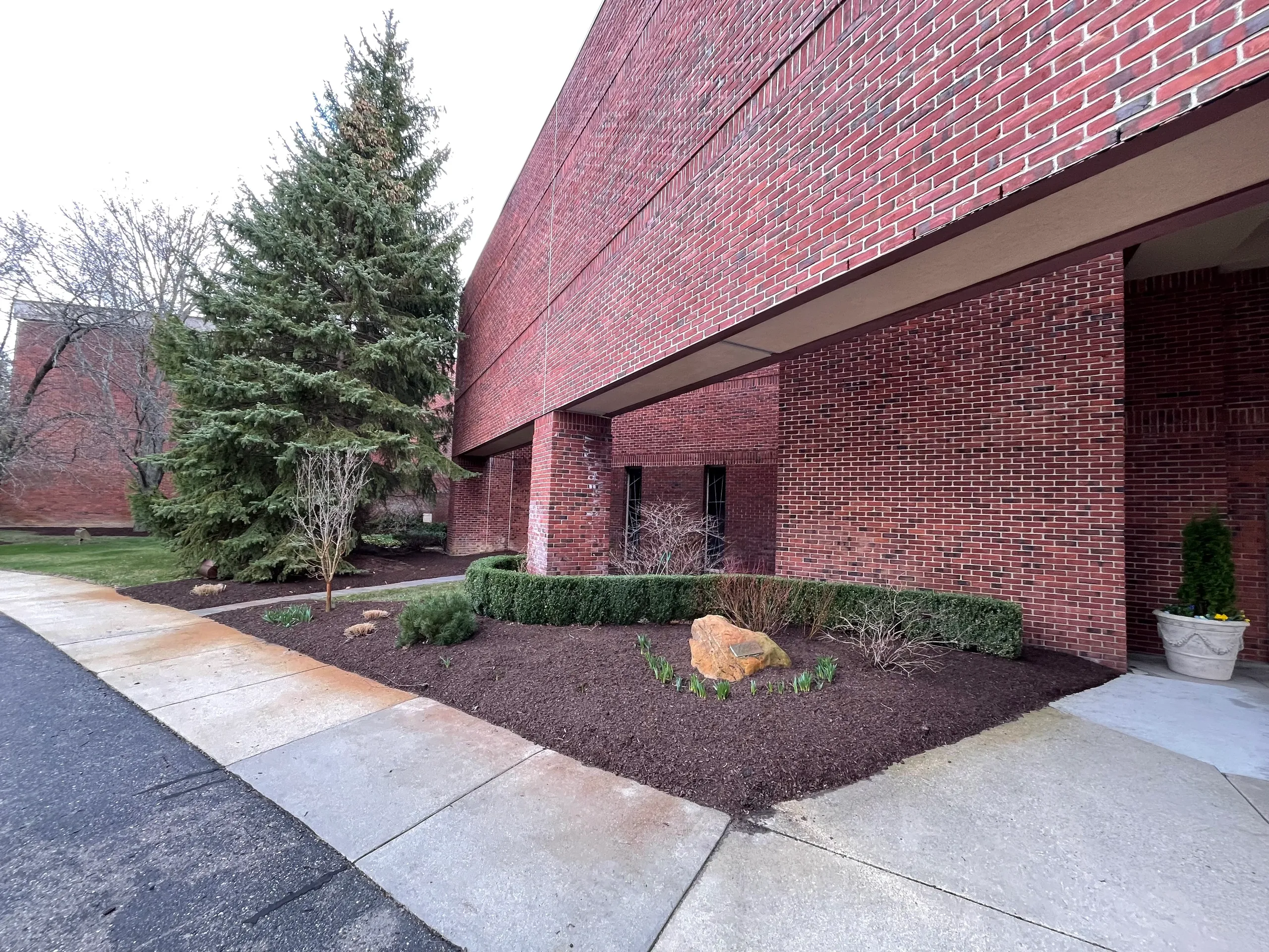 Professional commercial landscaping and mulch installation by Jake's Lawn Care Michigan