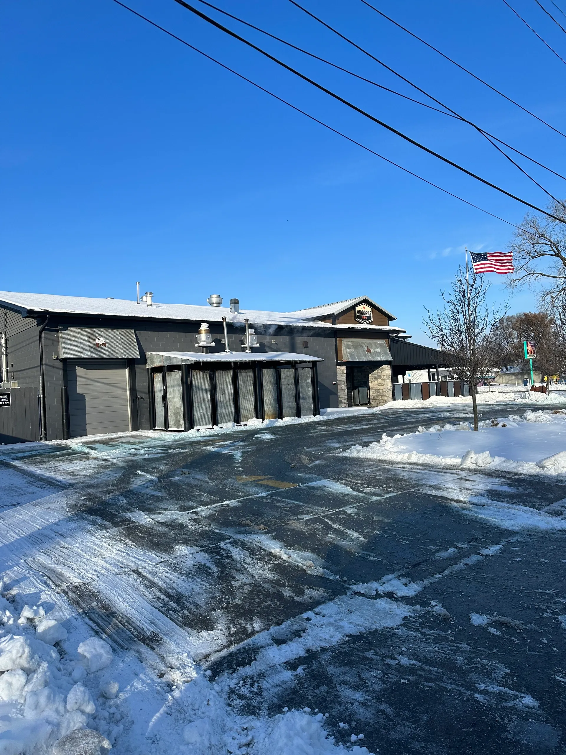 Commercial snow removal and ice management services for Michigan businesses by Jake's Lawn Care winter maintenance
