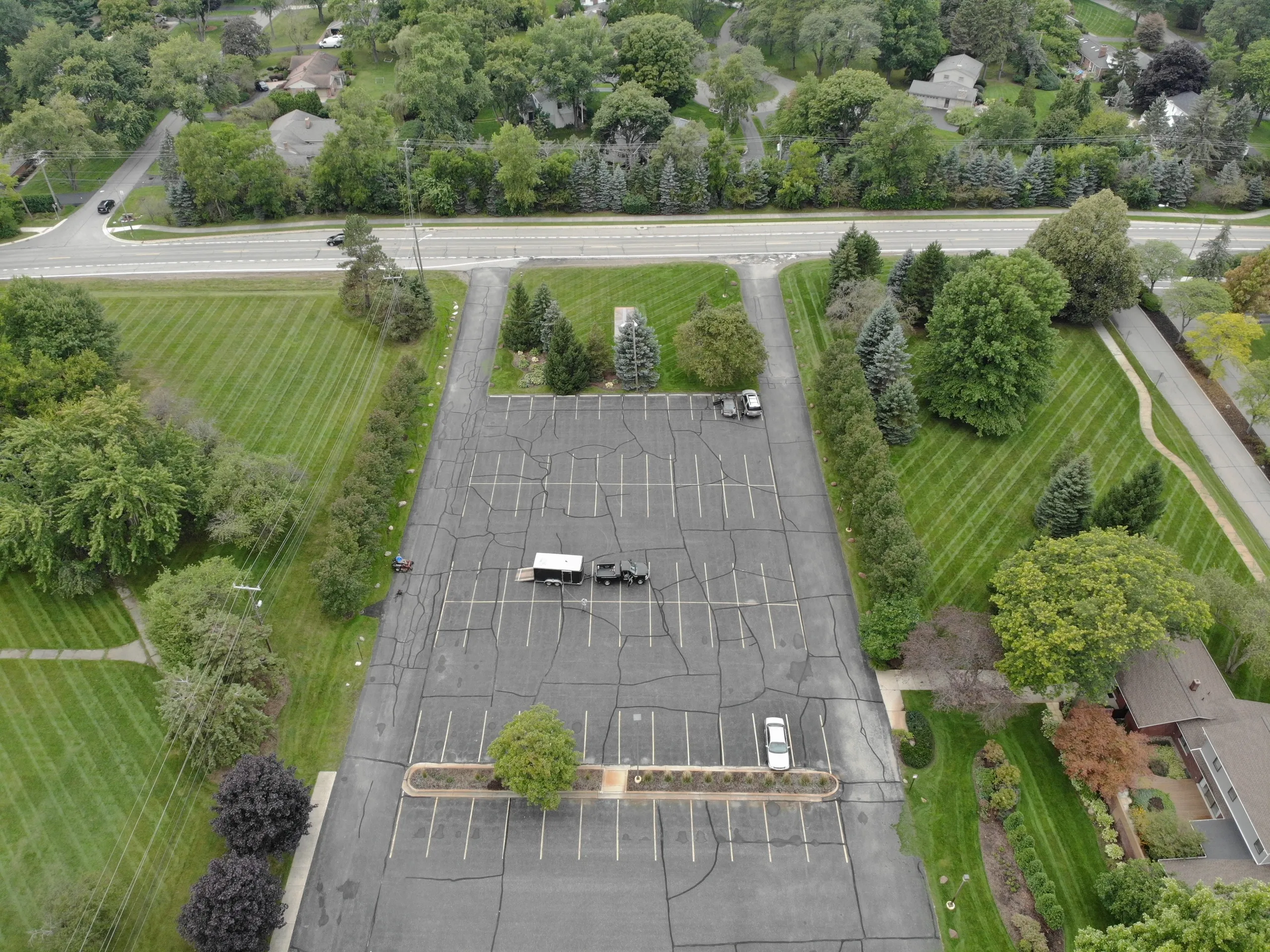Aerial view of large commercial lawn maintenance and mowing service by Jake's Lawn Care Michigan