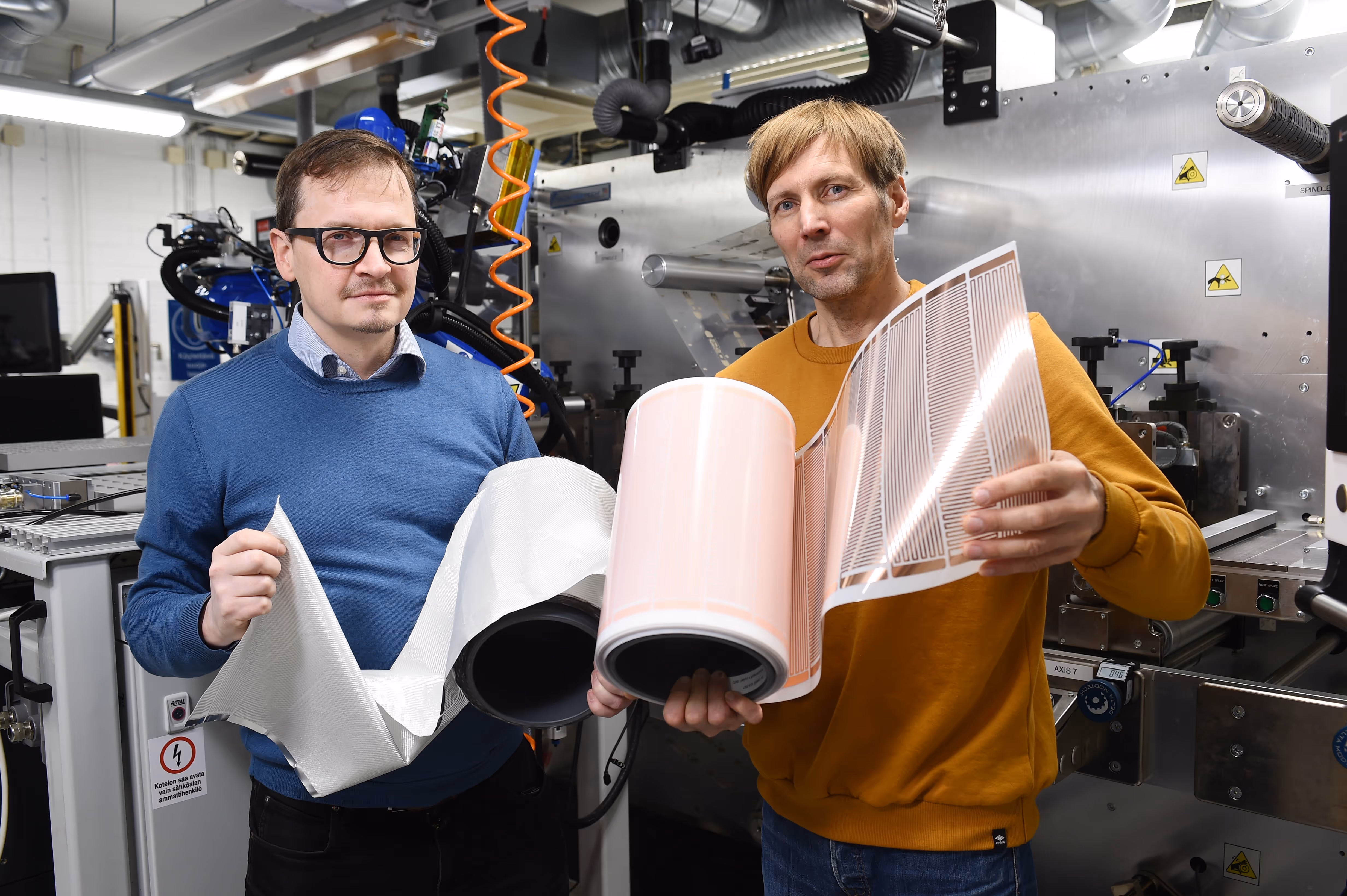 A picture of TWSC team with their Halia technology in their hands
