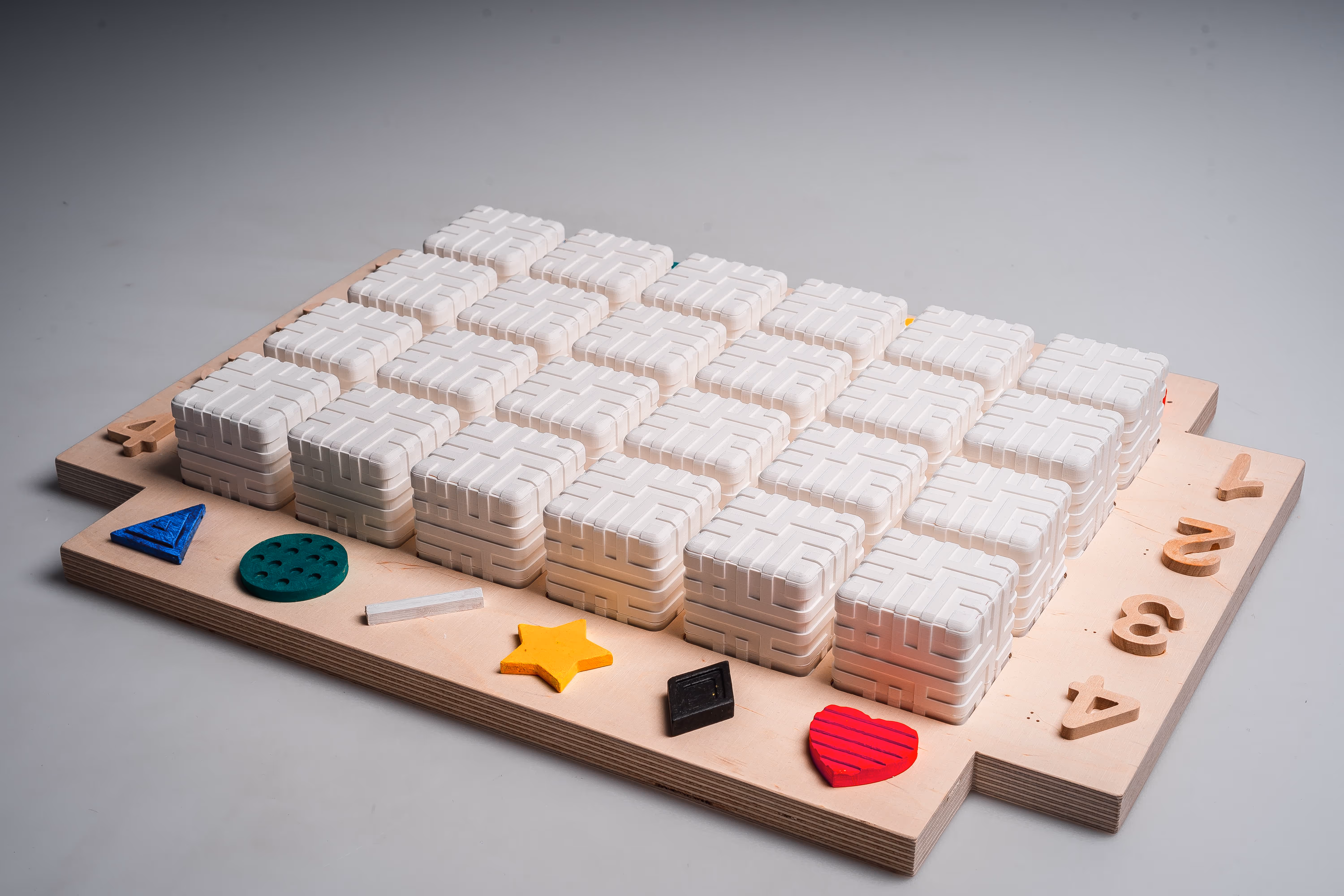 A photo of the visually impaired project board and all the cubes inside the board.