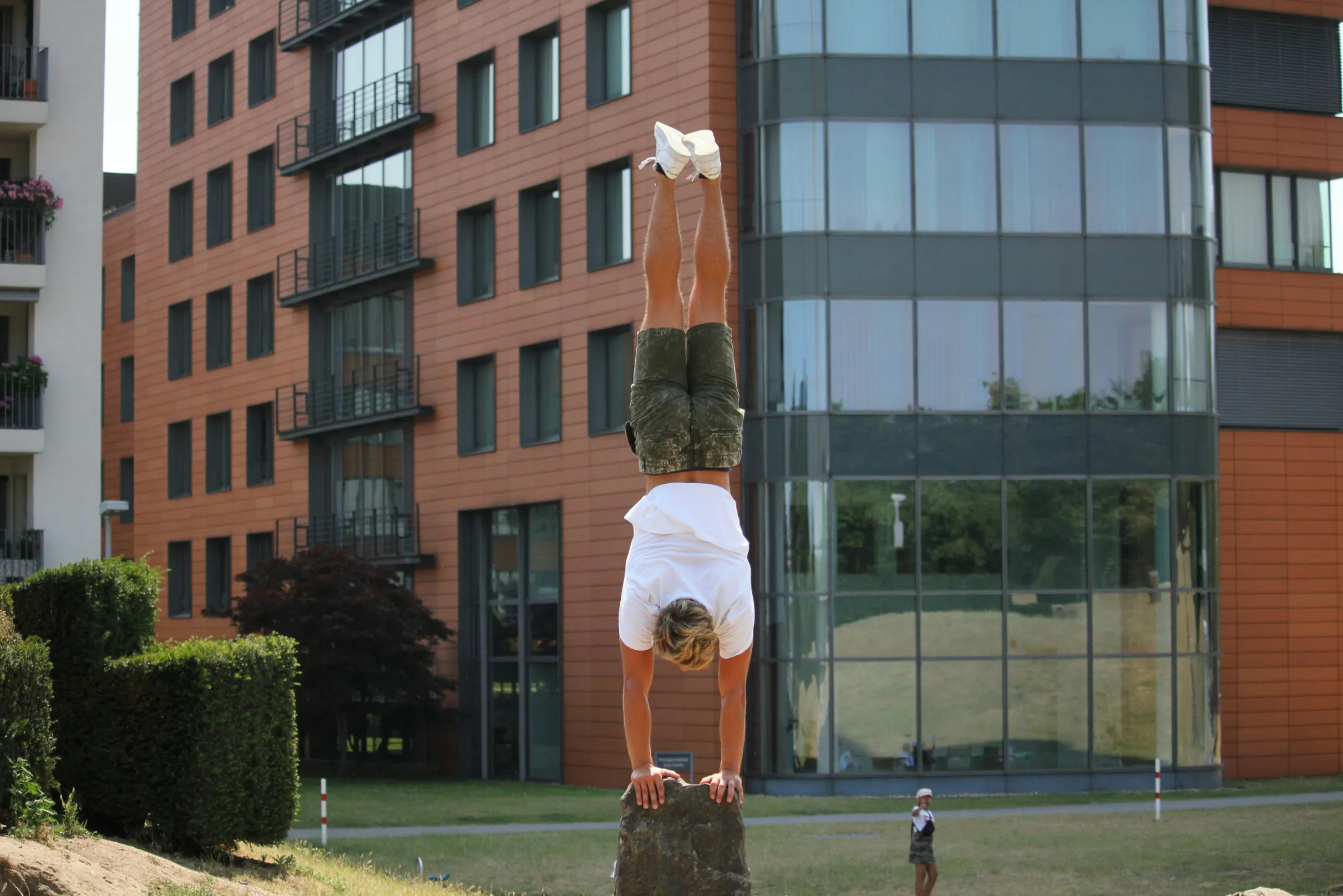 Athlete doing a hand stand