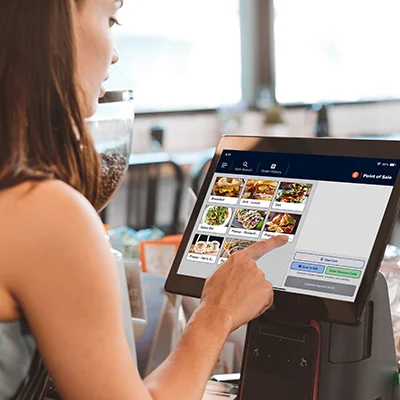 woman using a point of sale system