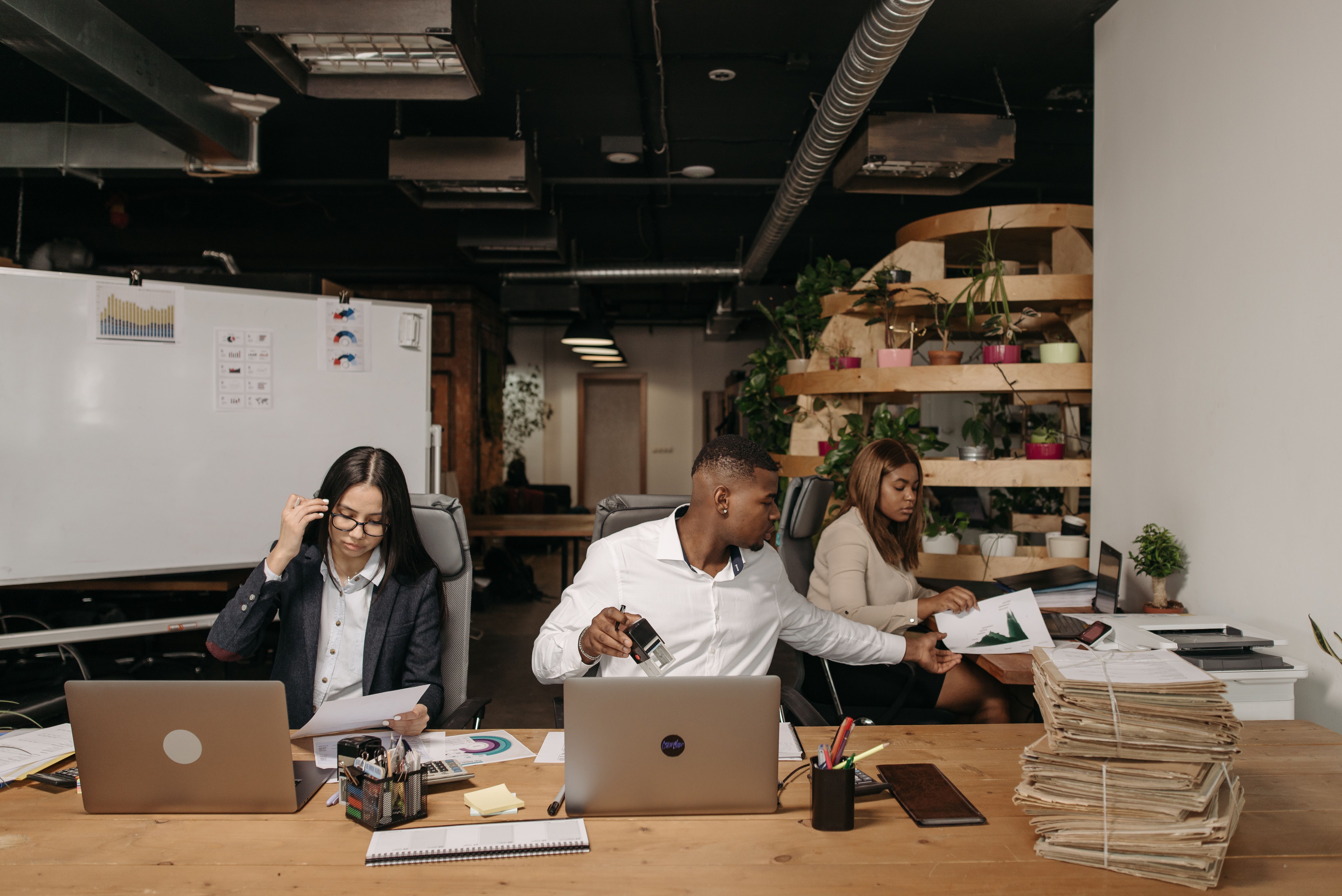 Busy law firm employees working around varying schedules