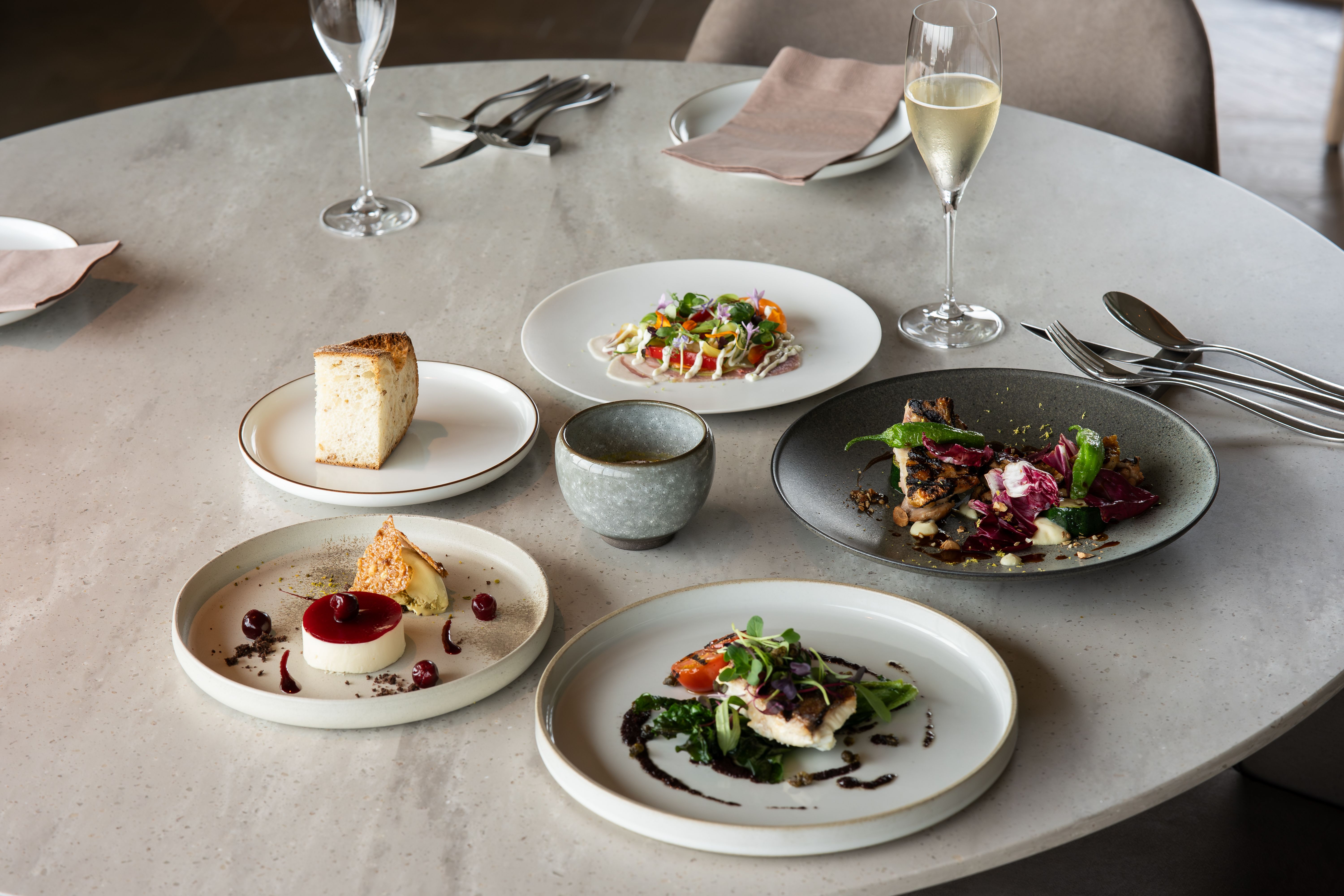 Plated dishes at a fine dining restaurant