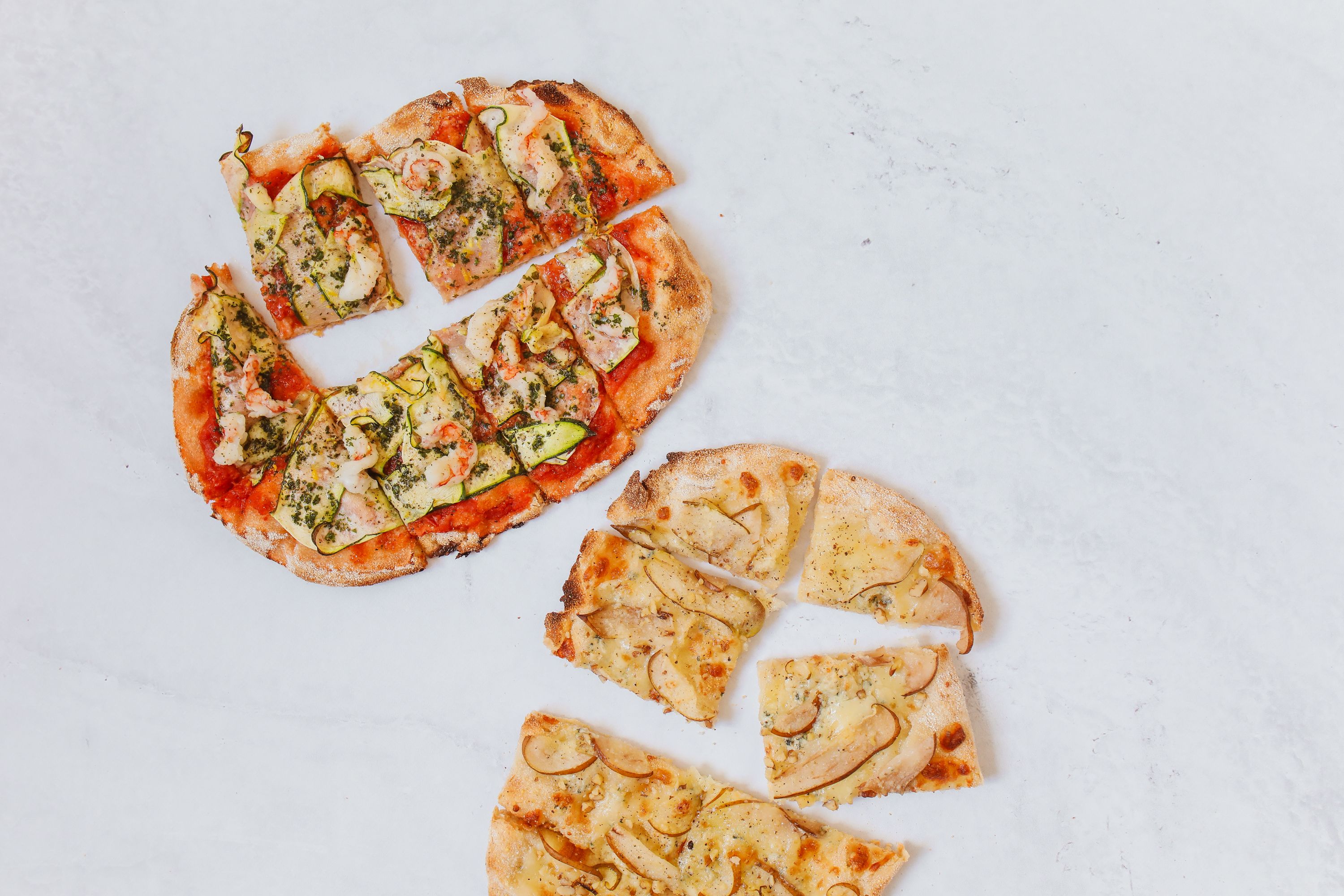 Two New Haven style pizzas