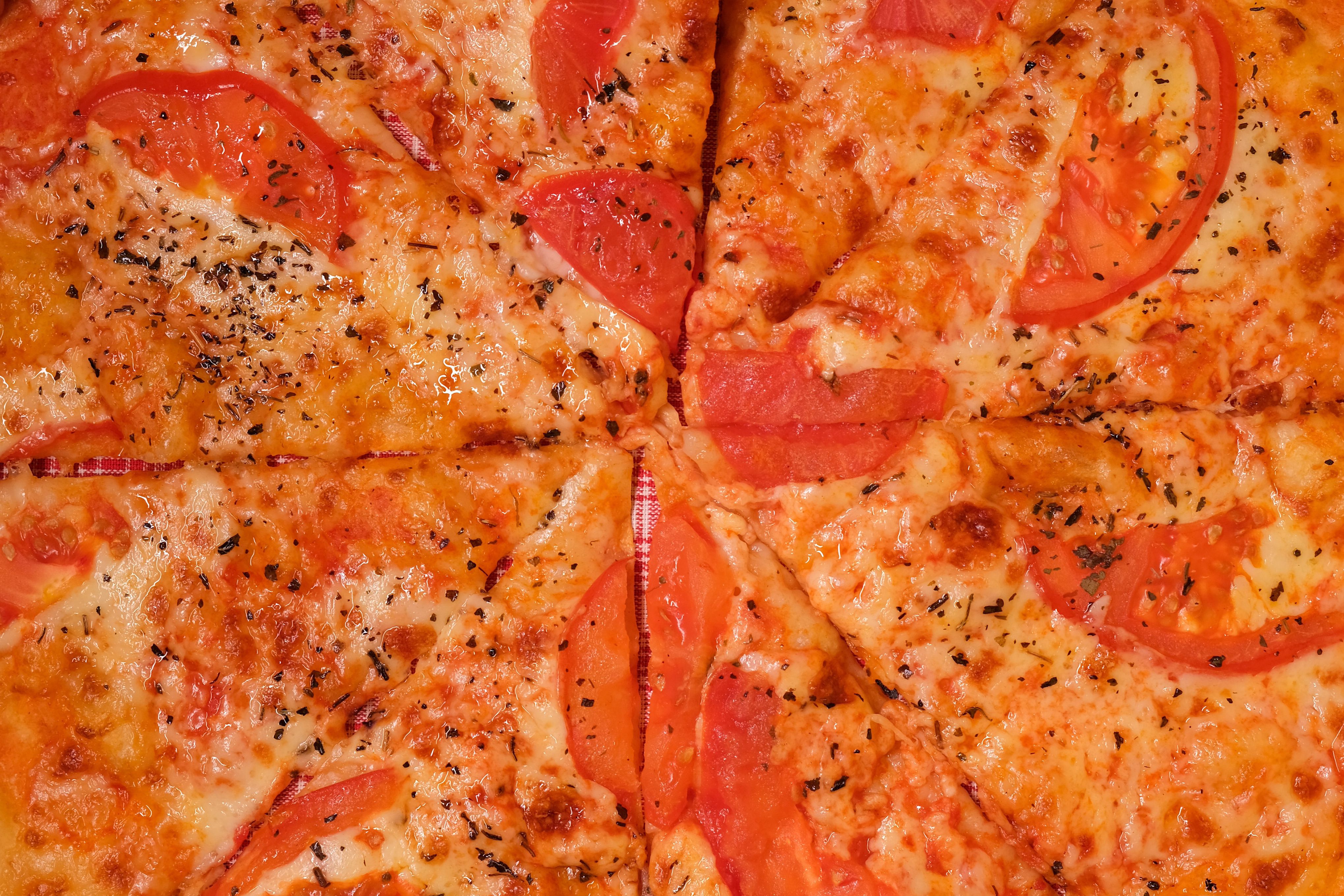 Close up shot of a New York-style pepperoni pizza