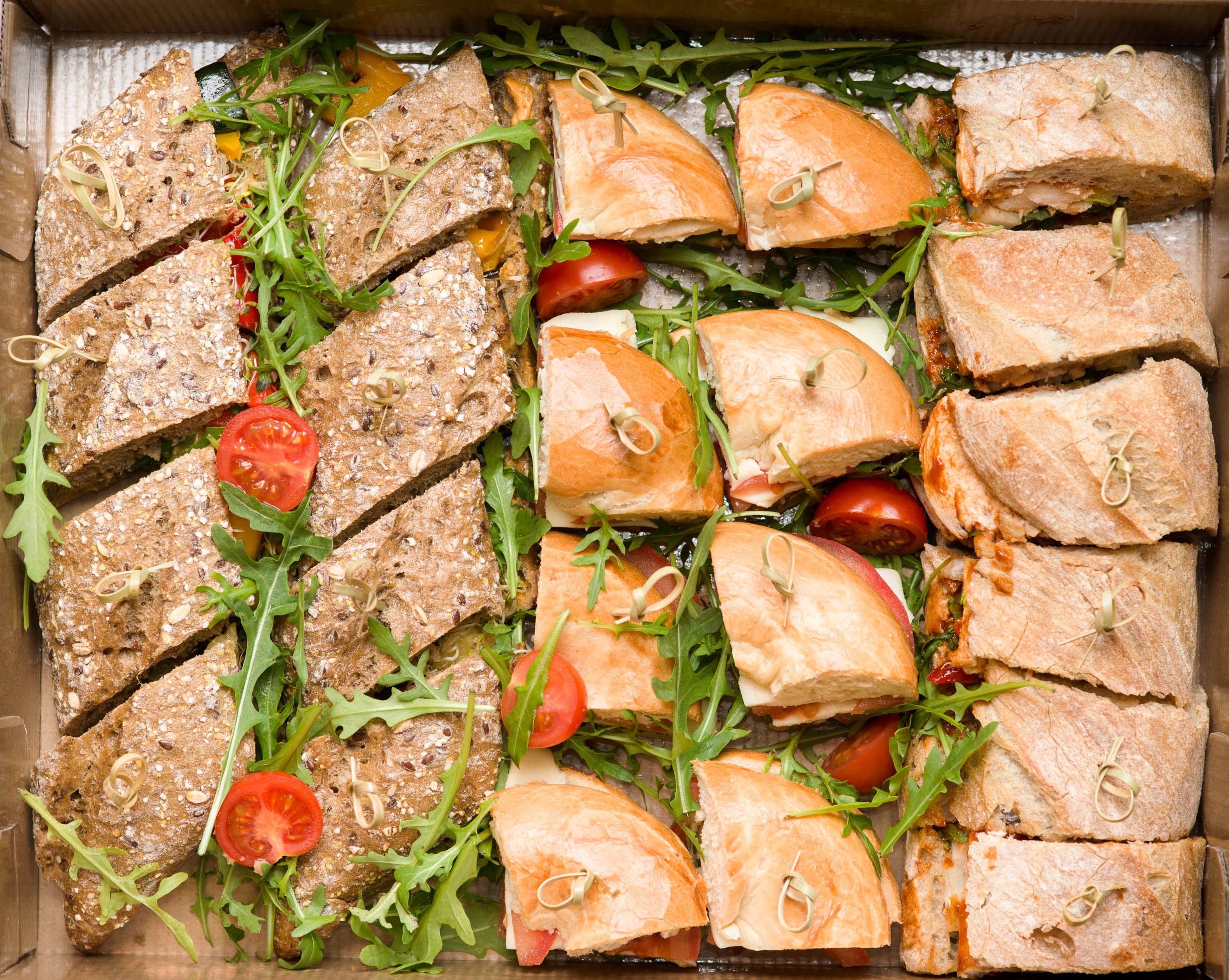 Box filled with catered sandwich options