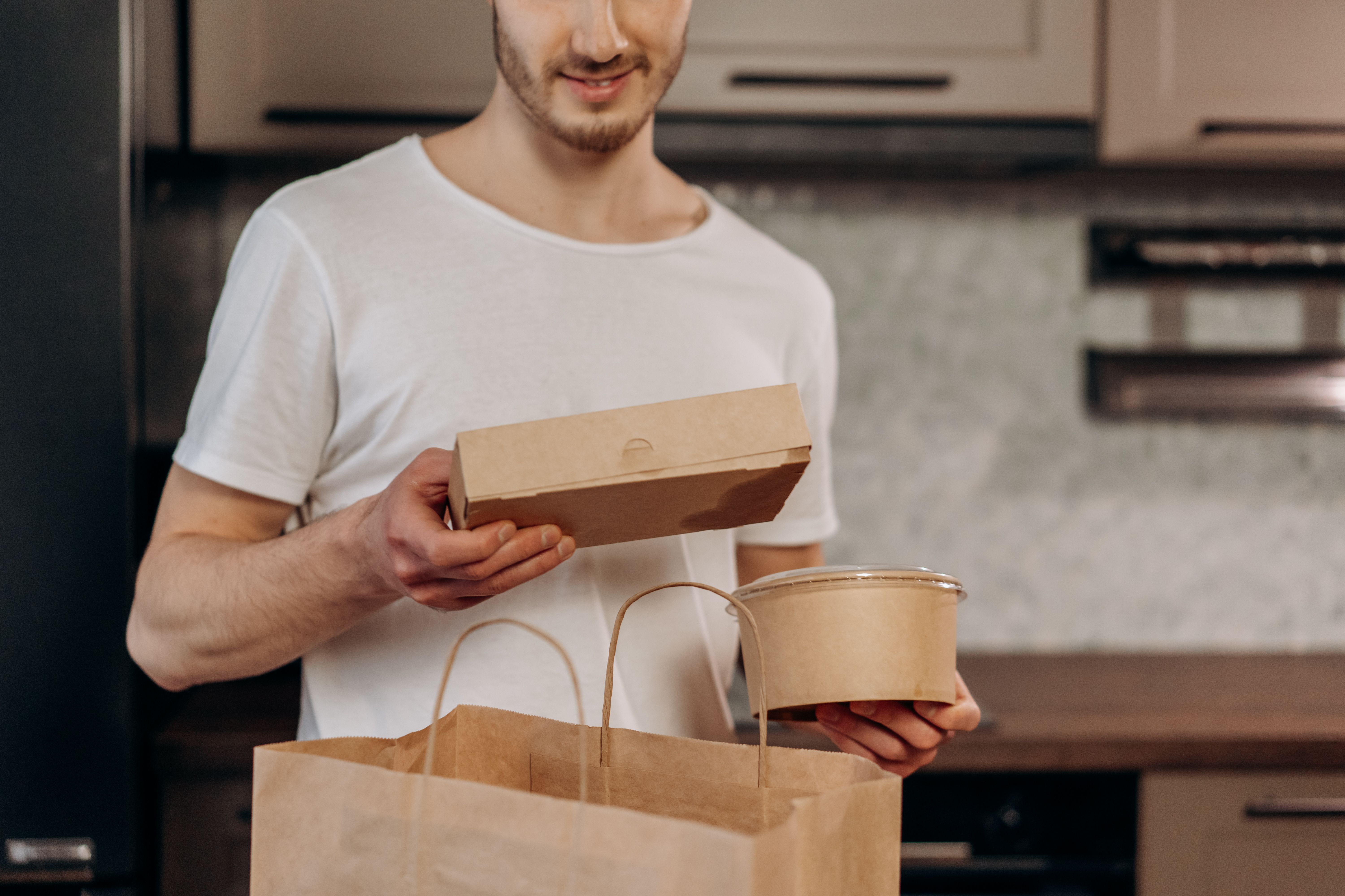 Employee looking at lunch delivery