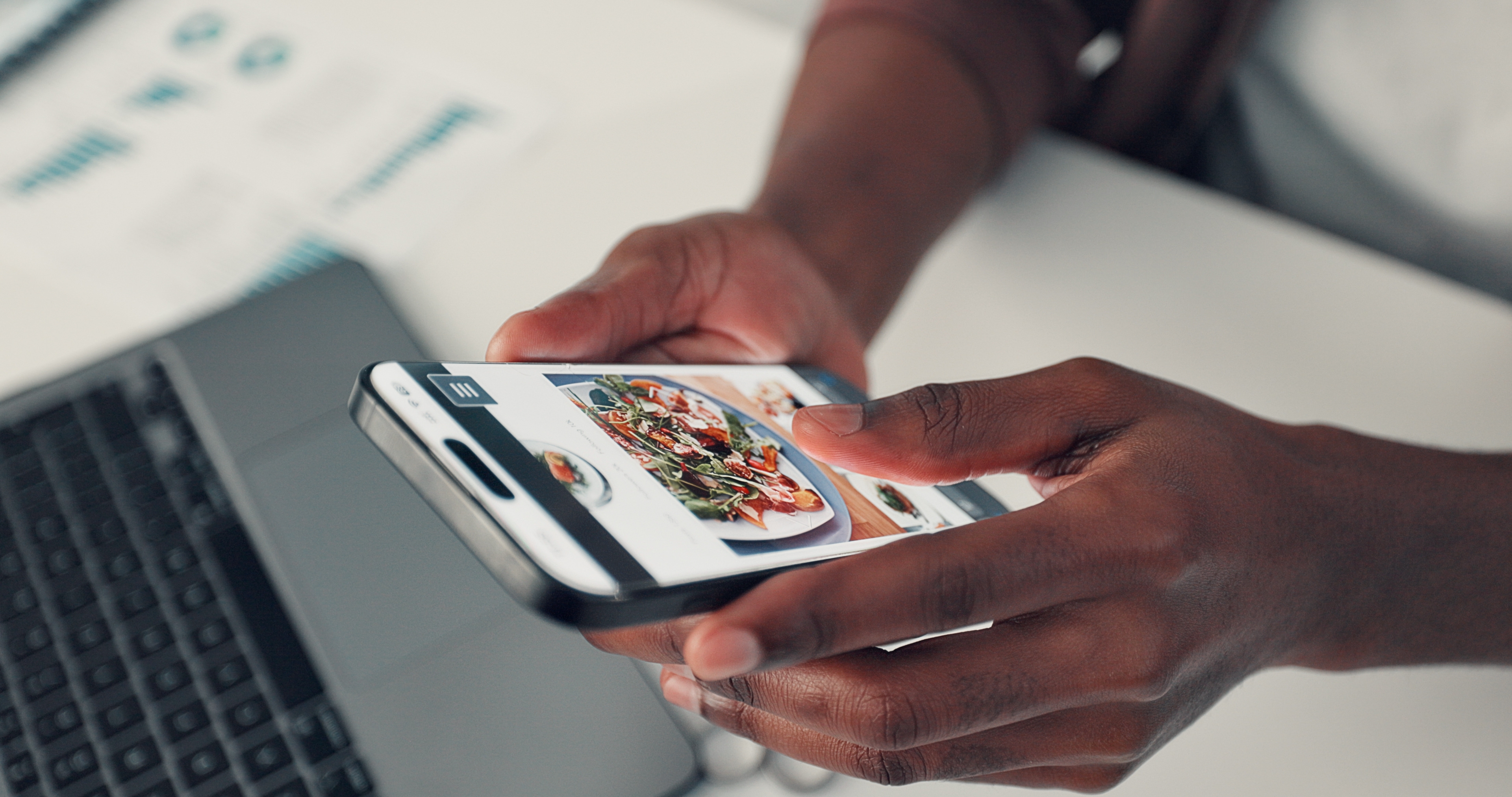 Close up shot of someone ordering delivery on their phone
